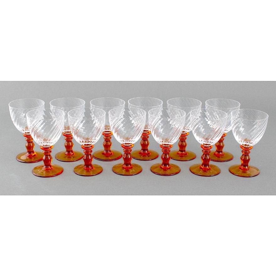 Experience the epitome of French refinement with this stunning Portieux Crystal Stemware service, expertly crafted for 12 people. The set features a clear bowl and exquisite amber-colored stems, embodying the perfect blend of elegance and artistry.