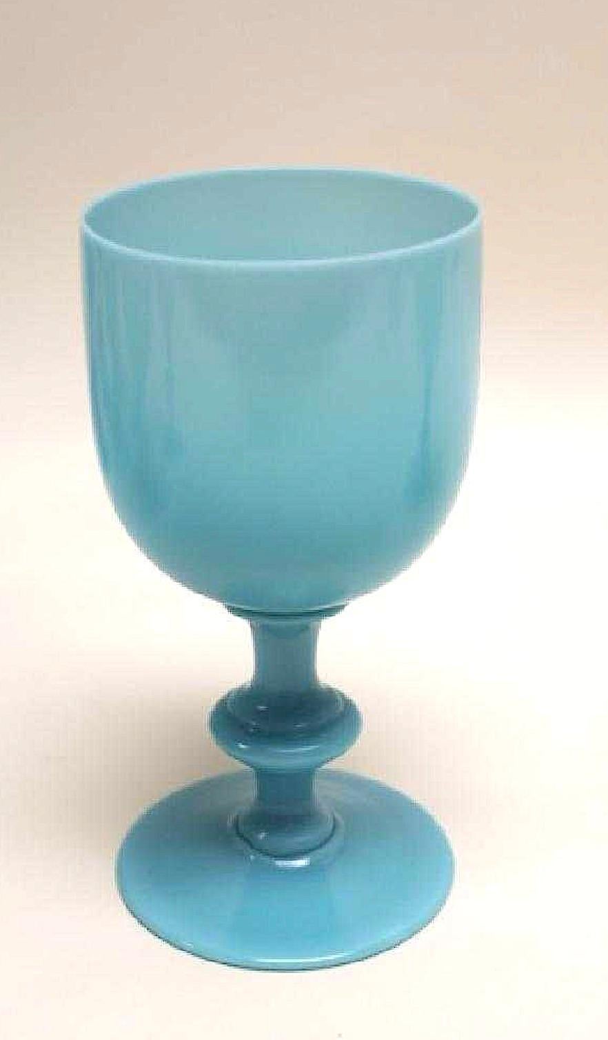 A hard to find beautiful large set of ten, circa 1930.
An Oil Tycoon's set of ten gorgeous French turquoise blue opaline large Goblets Stemware by Portieux Vallerysthal.
The glasses create a beautiful table setting for your most outstanding artful