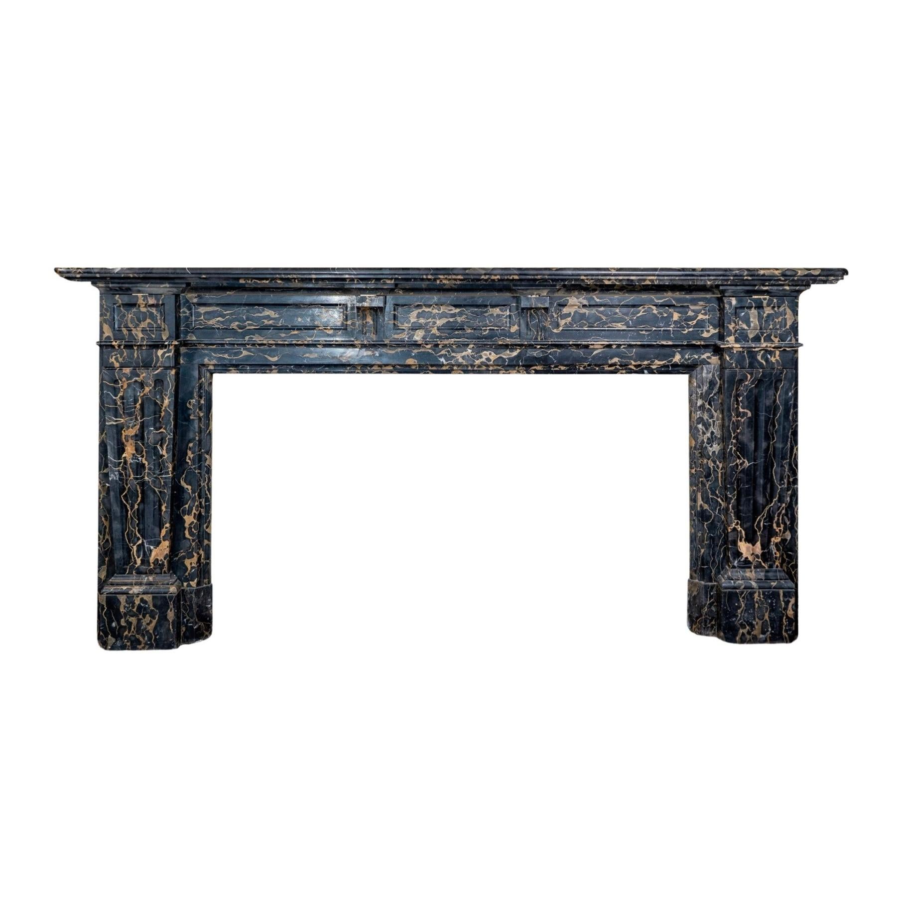 Crafted from luxurious Portor marble and designed in the timeless Louis XVI style, this French-made mantel exudes elegance and sophistication. Dating back to the 1880s, its low line silhouette adds a touch of modernity to any living space. Elevate