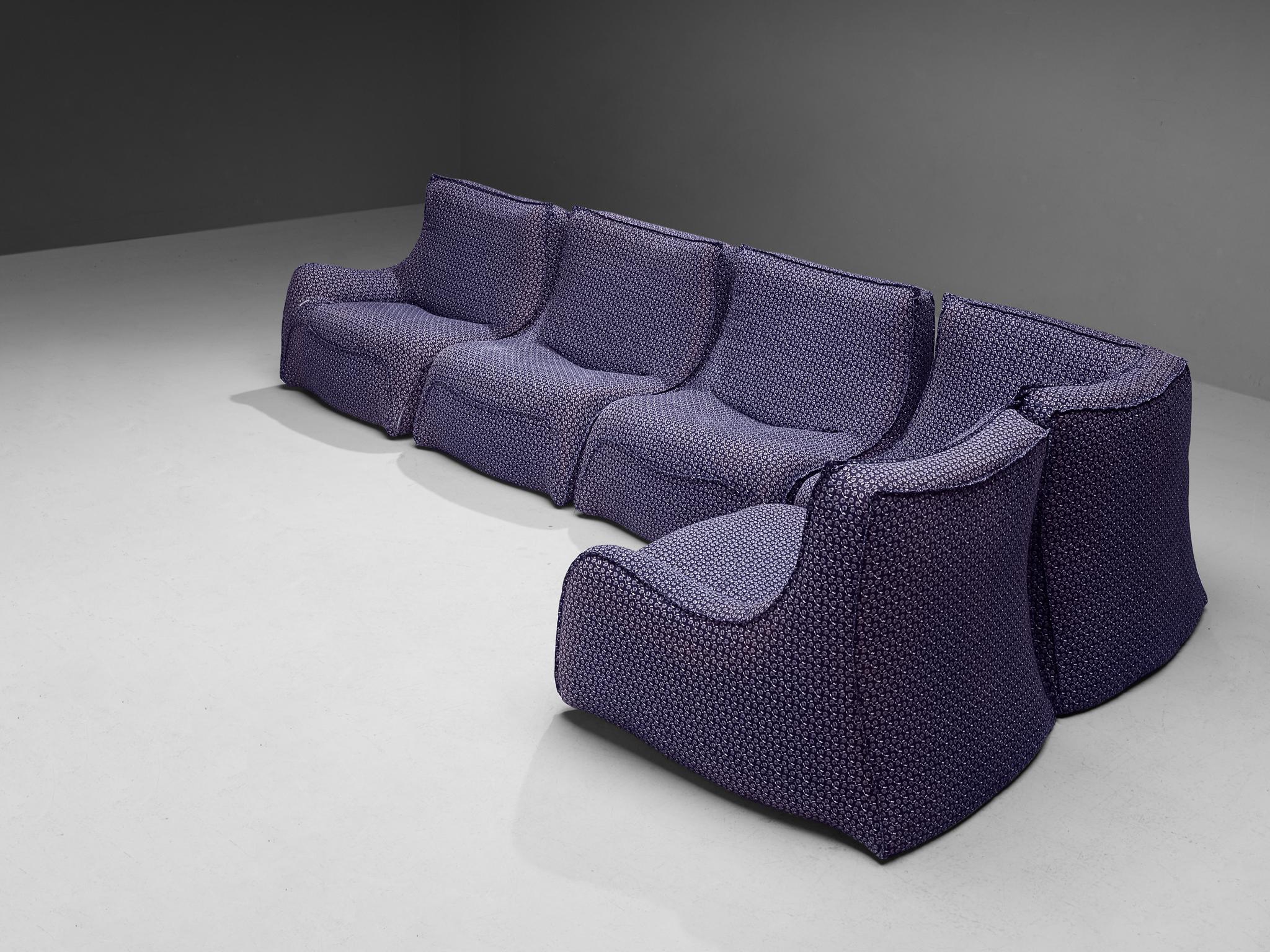 Ligne Roset, sectional sofa, fabric, foam, France, 1970s

This organically shaped sofa is executed in a fresh purple fabric with subtle white flower motive. This sofa has an angular and tapered shape upwards, and at the back the design flares out