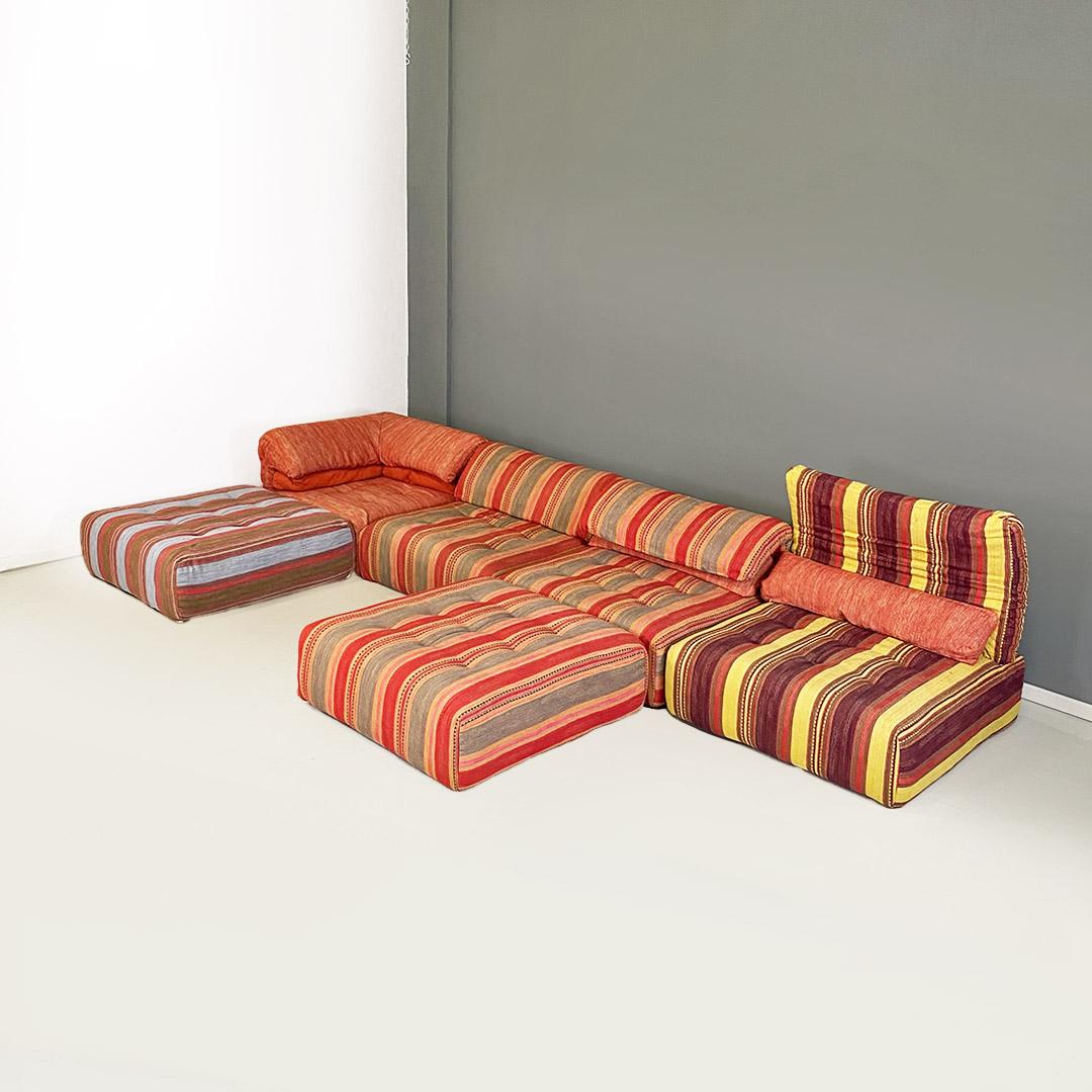 French post modern Voyage Immobile modular sofa by Studio Roche Bobois, 1990s.
Modular sofa, Voyage Immobile model, upholstered in its original fabric with multicolored bands and made up of six pieces, one of which is angular, three with single