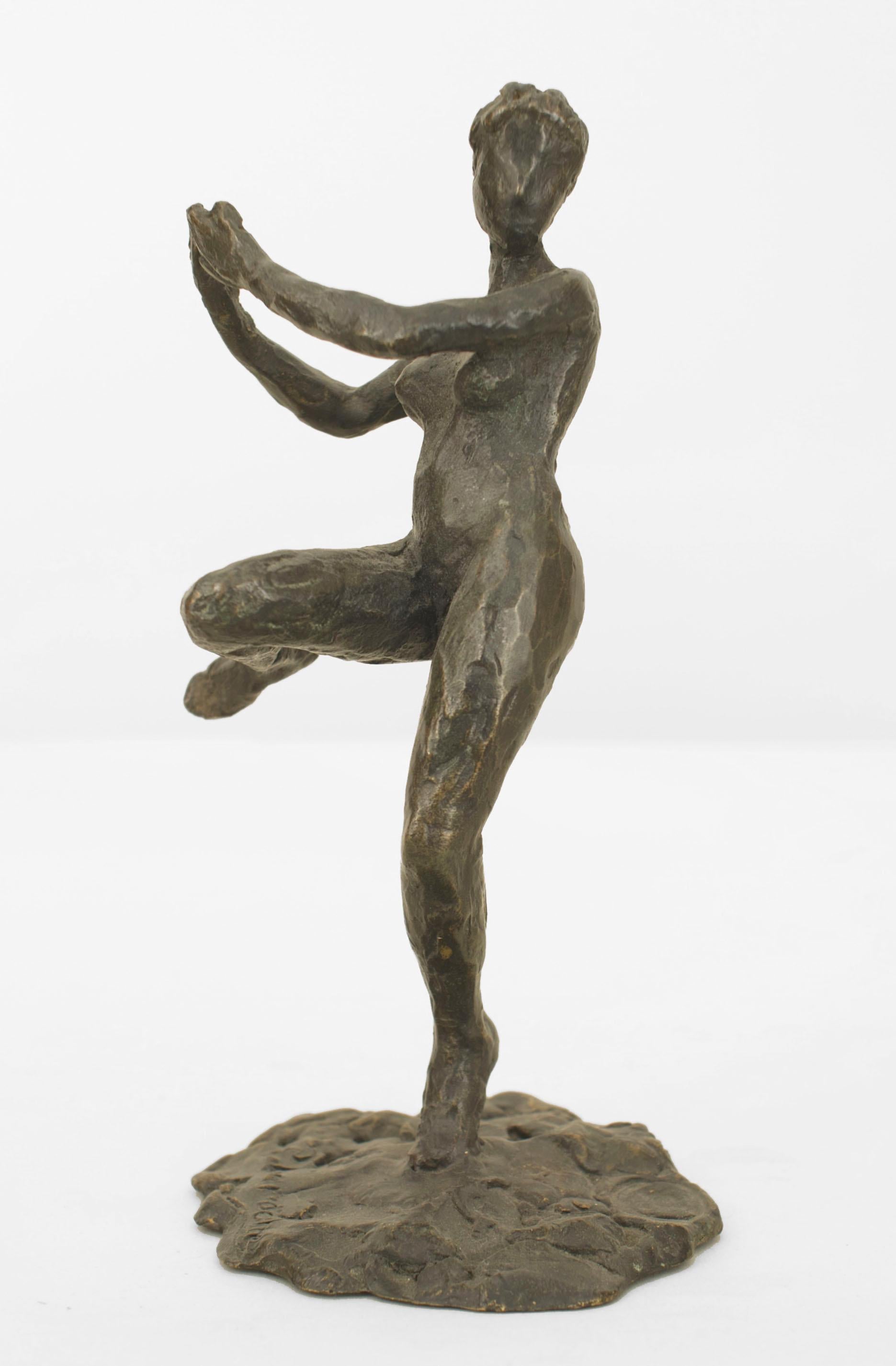 6 French Post-War design (1980/90s) bronze individually stylized female figures in poses standing on one foot on a round shaped base (signed LaROCHE) (priced each).
     