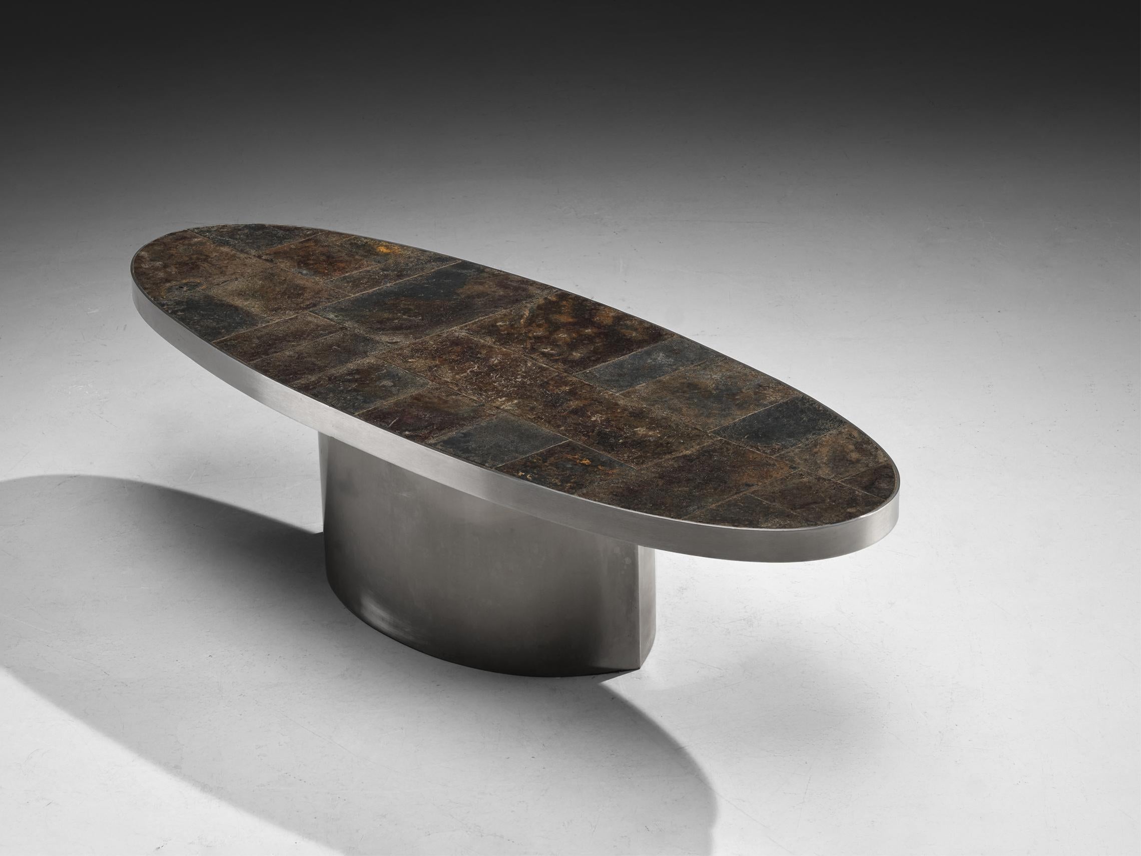 Coffee table, slate, steel, France 1970s

This stunning coffee table from France, crafted in the 1970s, is a perfect embodiment of bold design and postmodern elegance. Featuring a sleek steel base and a beautifully textured slate top, this piece
