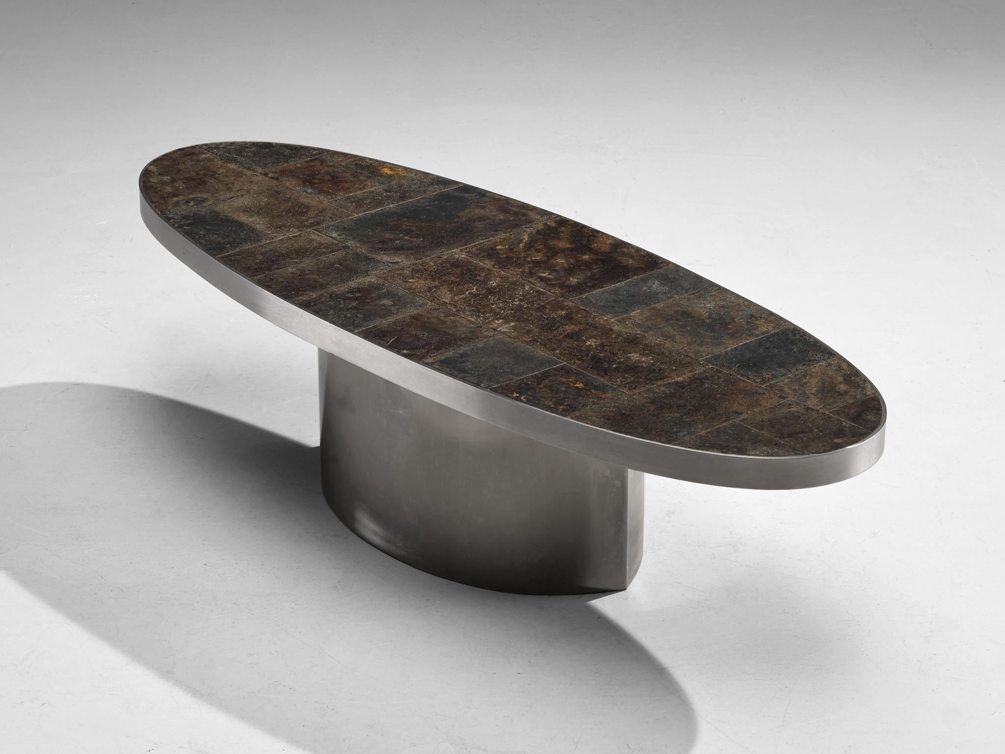 Coffee table, slate, steel, France, 1970s

This stunning coffee table from France, crafted in the 1970s, is a perfect embodiment of bold design and postmodern elegance. Featuring a sleek steel base and a beautifully textured slate top, this piece