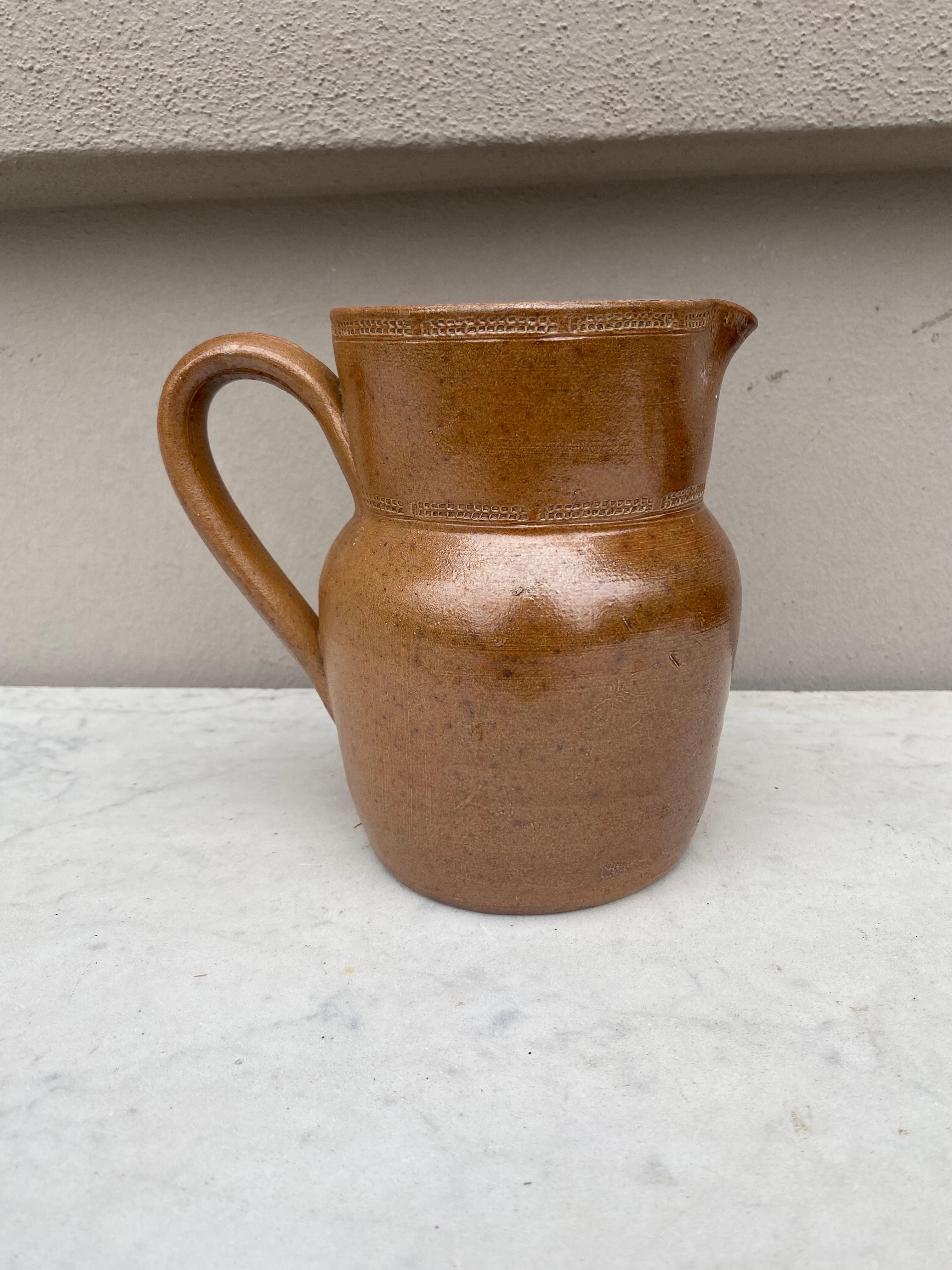 French brown pottery pitcher circa 1900.
 
