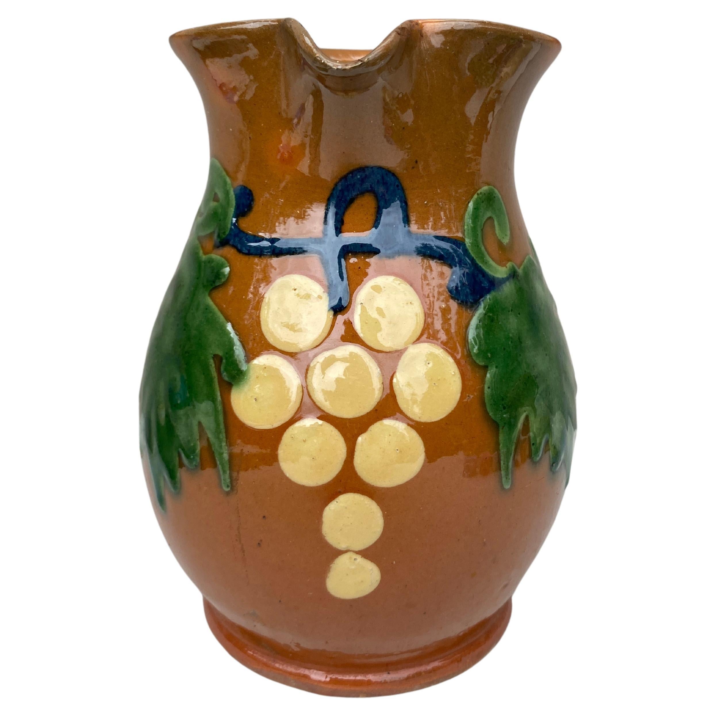 French Pottery Pitcher Savoie With Grapes , Circa 1890 For Sale