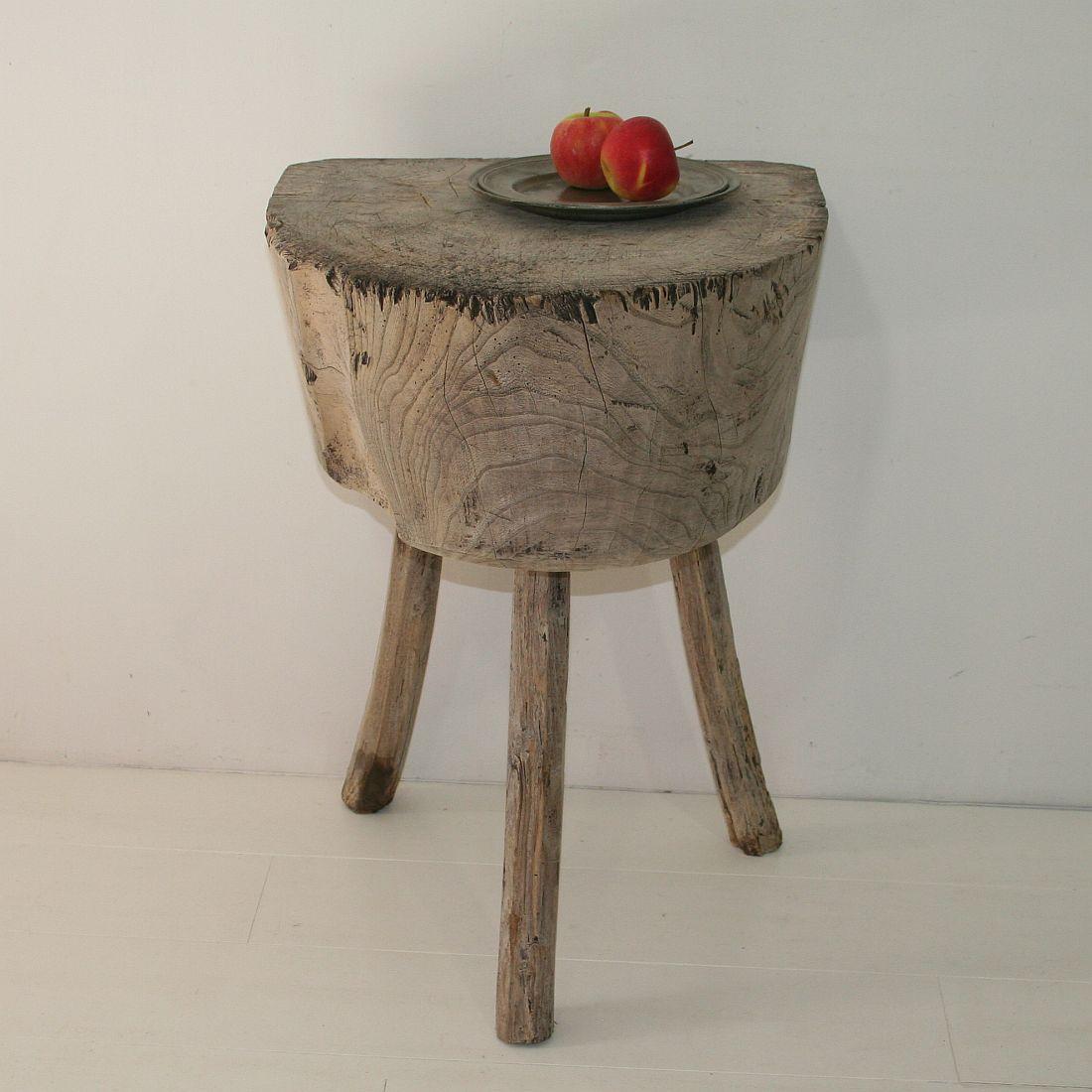 Beautiful weathered oak butcher's block. Great to use as a side table, France, circa 1850. Weathered, small losses.