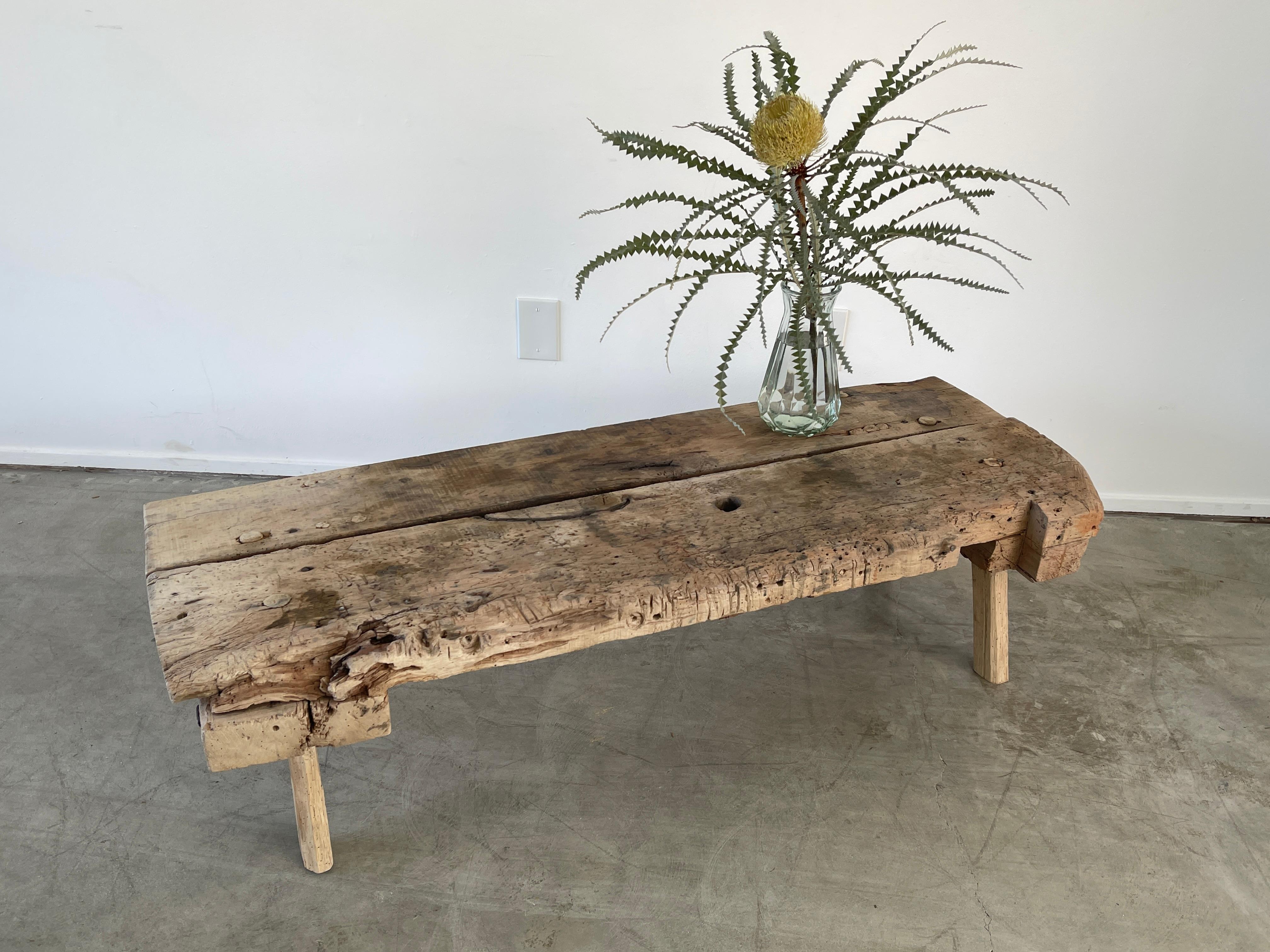 Raw edged bench or coffee table with wonderful patina 
European.