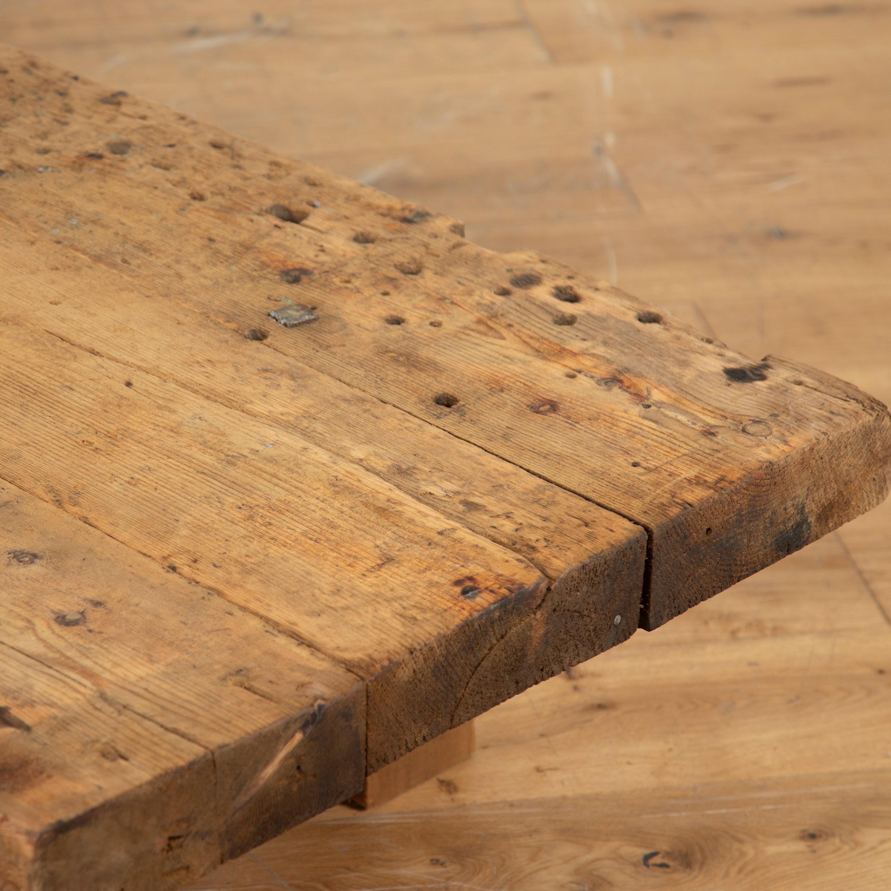 Fantastic French primitive coffee table.

An unusual French primitive wood coffee table on end supports which has a great deal of rustic charm.

Ideal for a large living room.