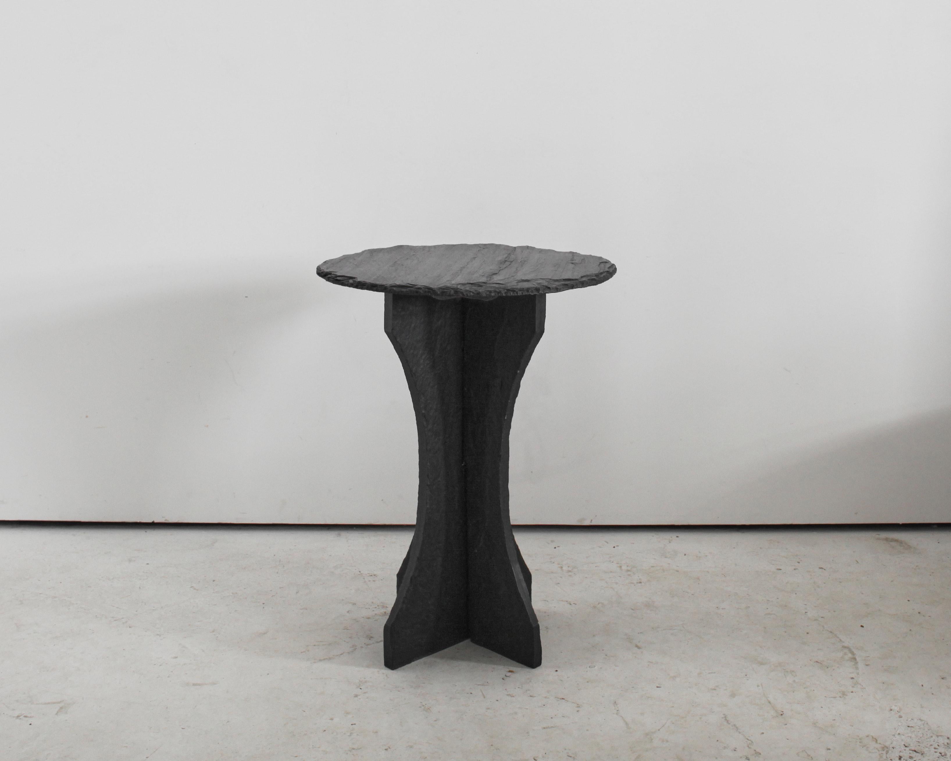 A C.1950s primitive riven slate occasional table/plinth from the Angers region of France.

Simple interlocking base. Able to be fully dismantled.
