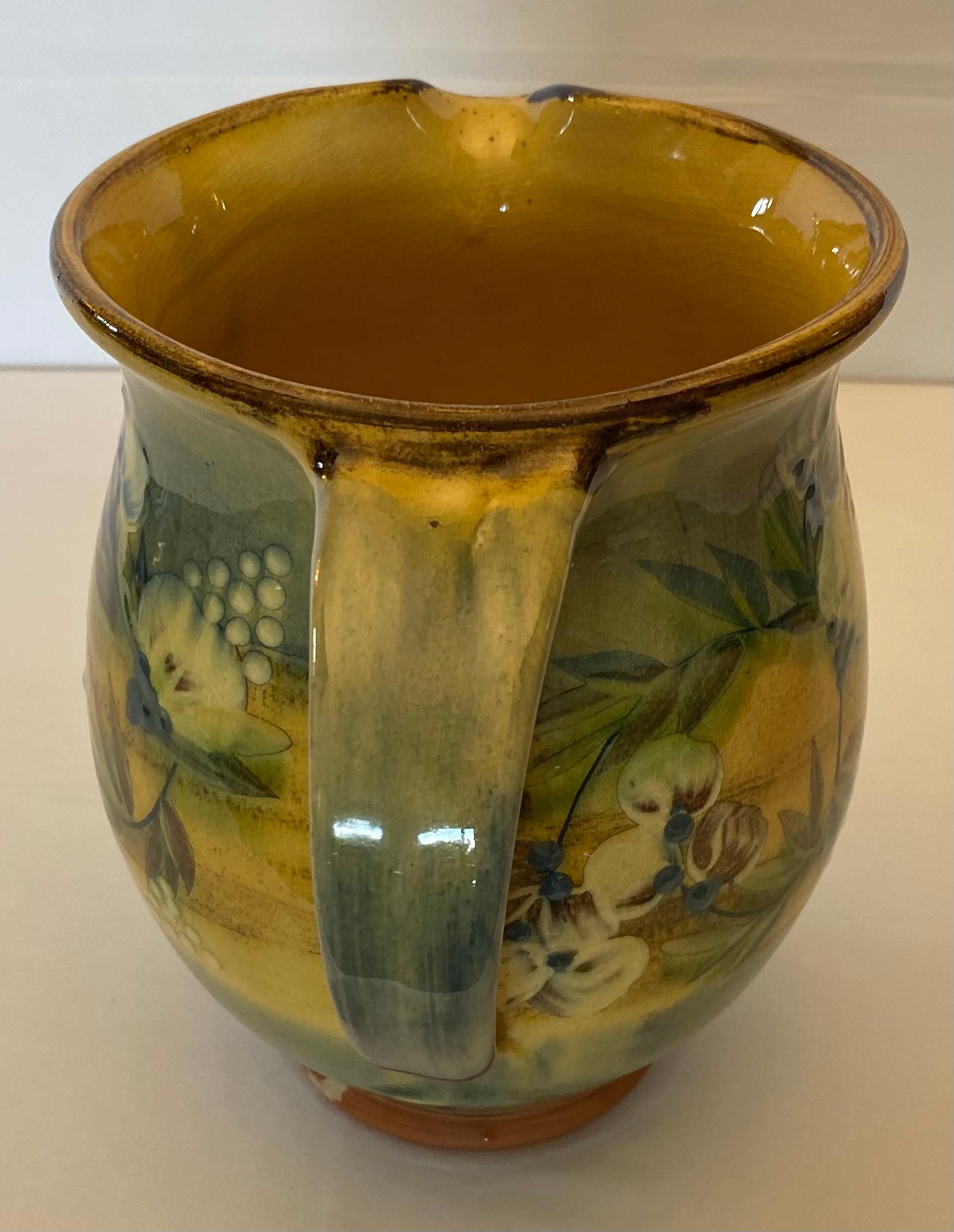 A fine hand-crafted ceramic pitcher vase from the Provence region of France. 

This French ceramic pitcher vase is very well made using clay from the region. Hand-painted then glazed making this piece particularly pleasing to the eye.

This piece
