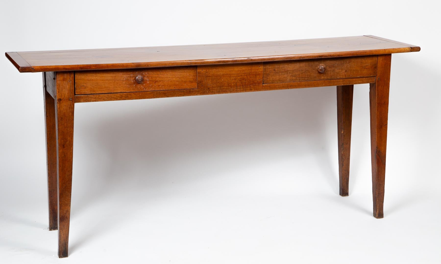 French Provencal Serving Table, early 20th Century. Fruitwood server with two drawers. A traditional provencal table with original, aged finish.
