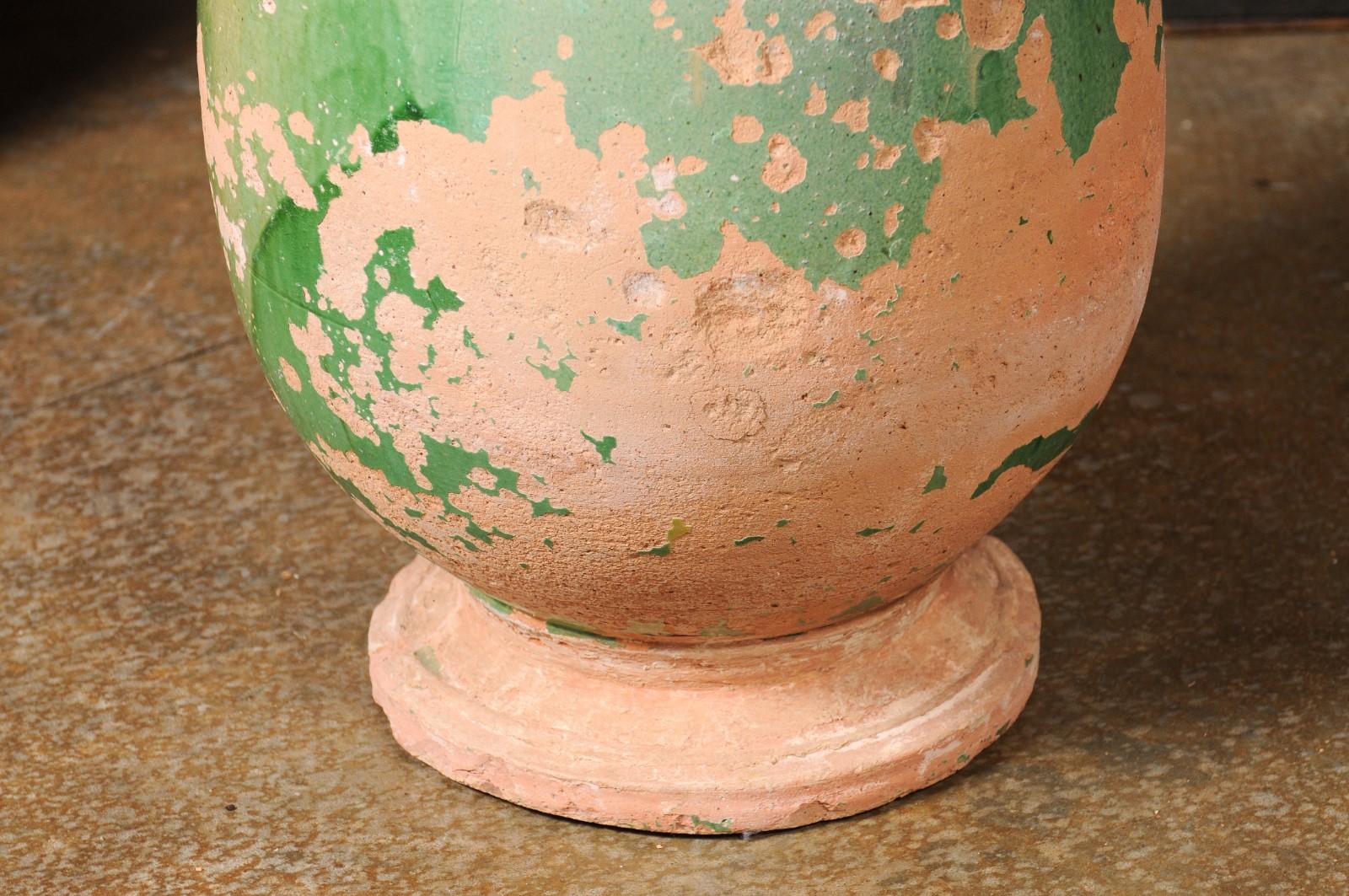 19th Century French Provincial 1880s Green Glazed Oblong Terracotta Jar with Weathered Patina For Sale