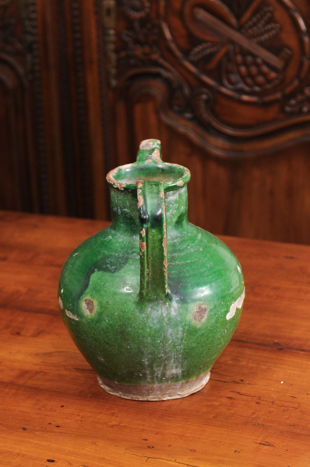 French Provincial 19th Century Distressed Green Glazed Pottery Jug In Good Condition In Atlanta, GA