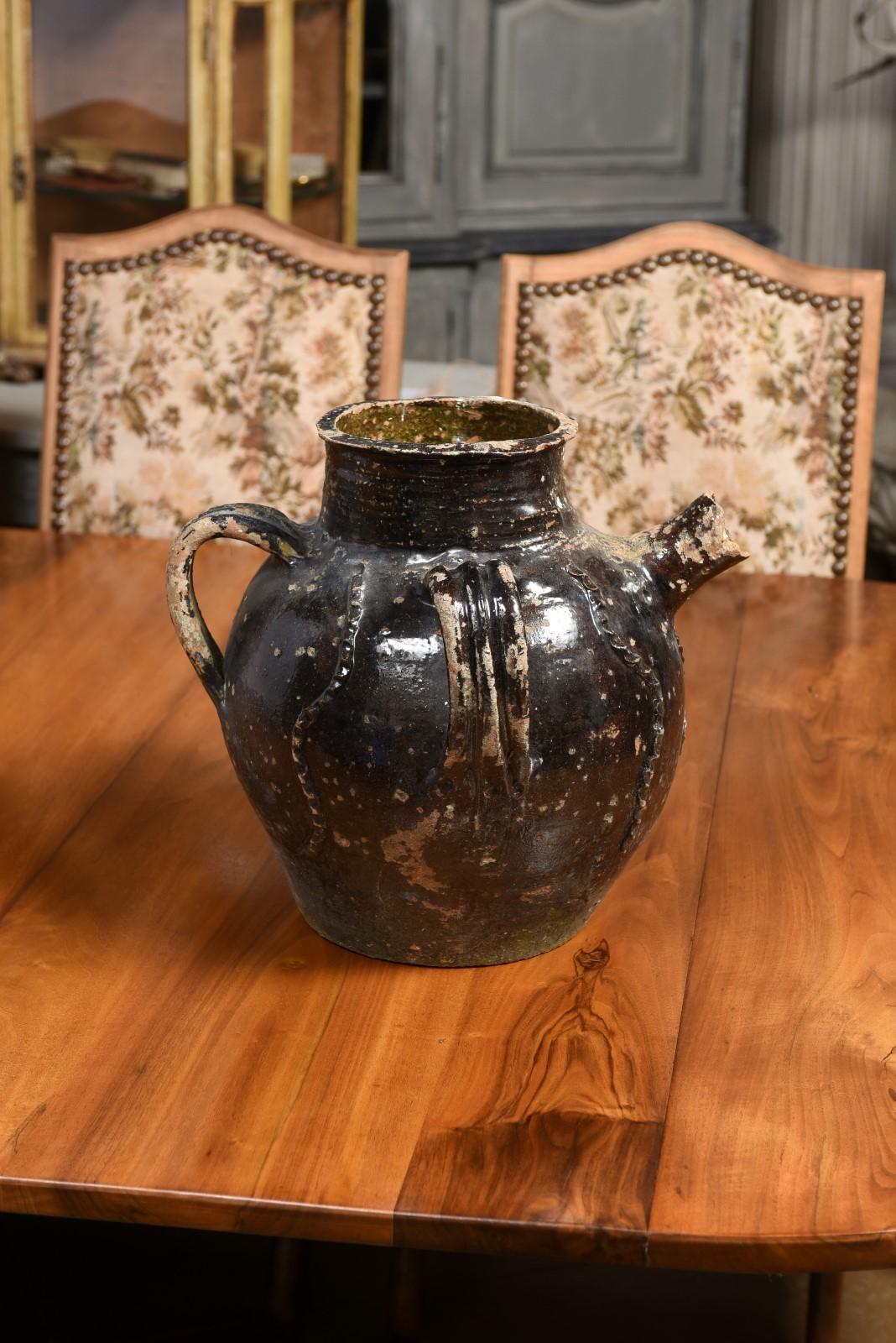 French Provincial 19th Century Glazed Pottery Pouring Jug with Three Handles For Sale 3