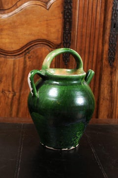 French Provincial 19th Century Green Glazed Olive Oil Jug with Distressed Patina