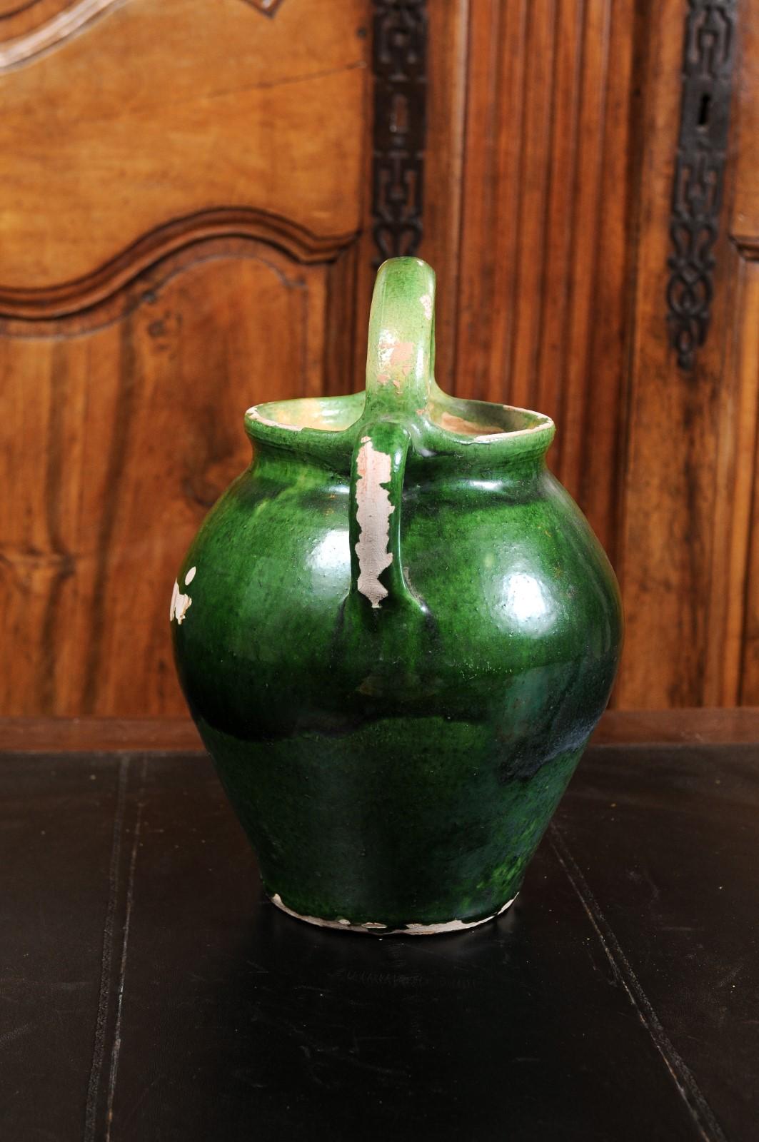 French Provincial 19th Century Green Glazed Olive Oil Jug with Distressed Patina In Good Condition In Atlanta, GA