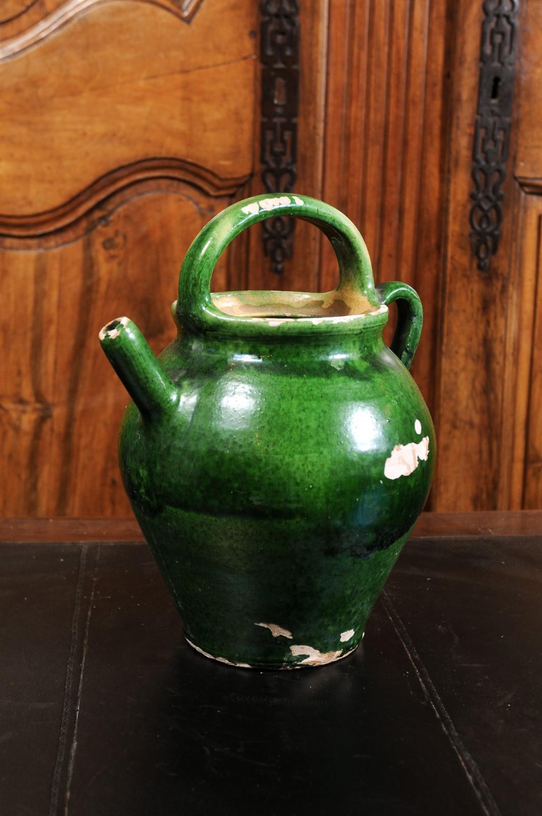 French Provincial 19th Century Green Glazed Olive Oil Jug with Distressed Patina 2