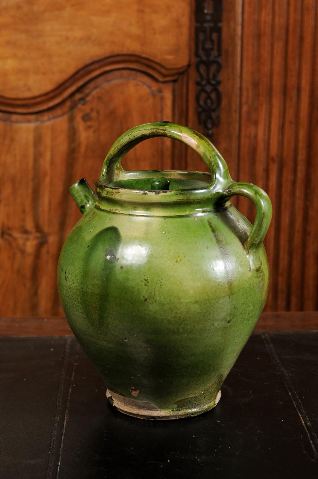 French Provincial 19th Century Green Glazed Olive Oil Jug with Weathered Patina 1