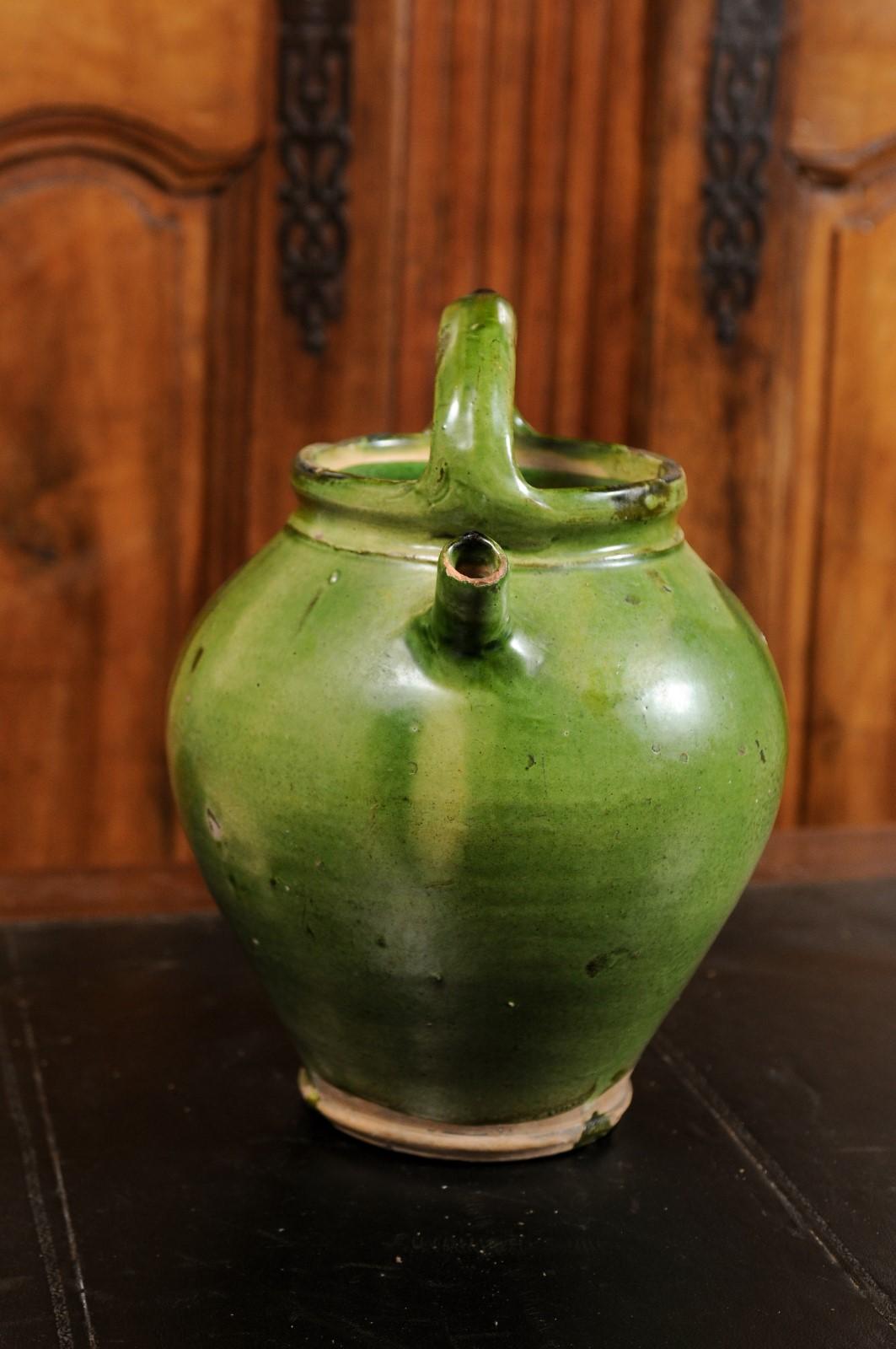 French Provincial 19th Century Green Glazed Olive Oil Jug with Weathered Patina 4