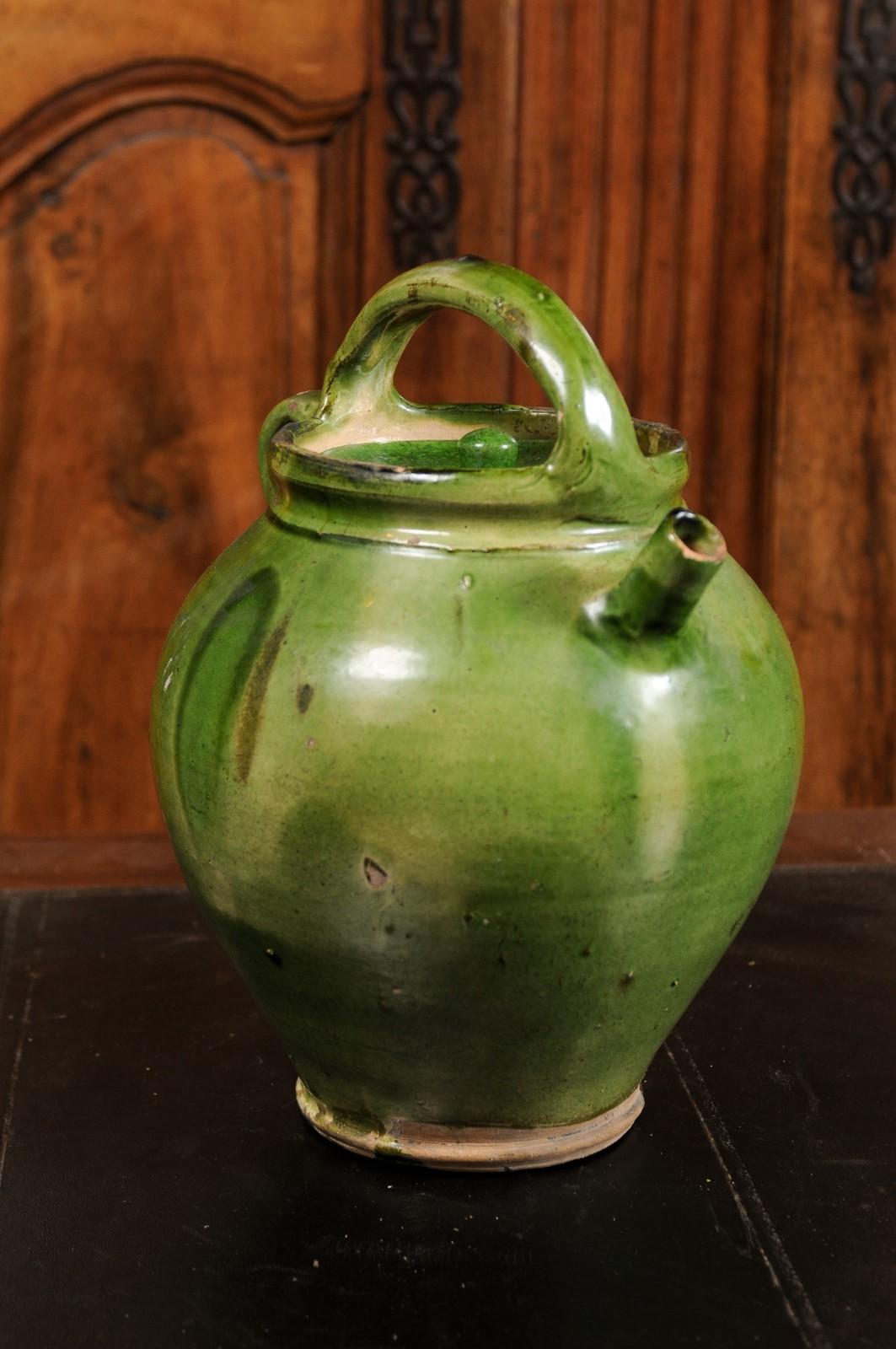French Provincial 19th Century Green Glazed Olive Oil Jug with Weathered Patina 5
