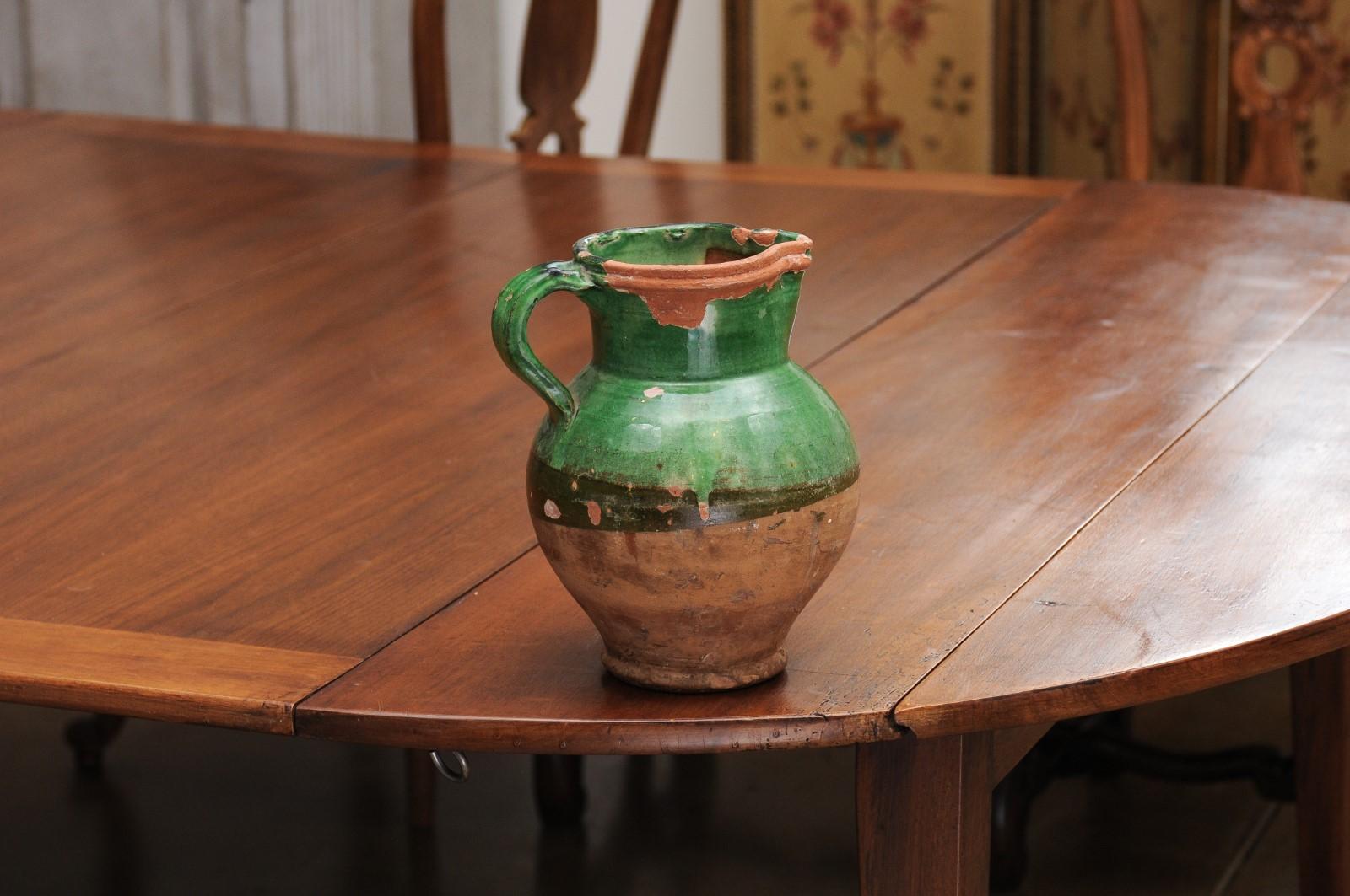 French Provincial 19th Century Green Glazed Pitcher with Distressed Patina In Good Condition In Atlanta, GA