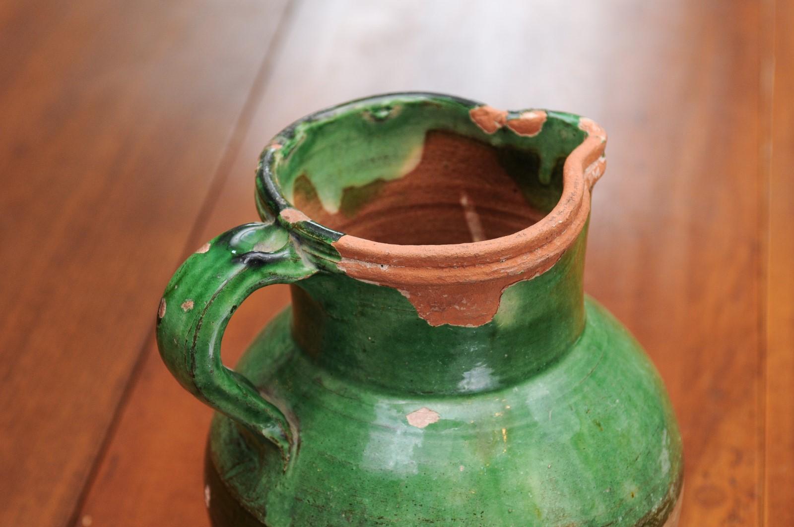 French Provincial 19th Century Green Glazed Pitcher with Distressed Patina 1
