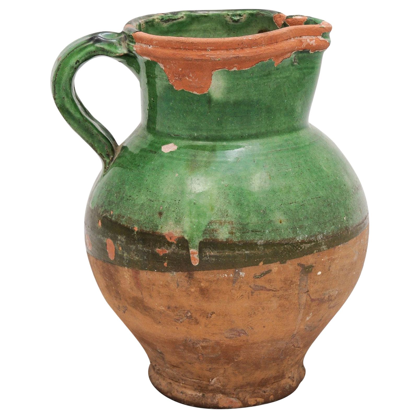 French Provincial 19th Century Green Glazed Pitcher with Distressed Patina