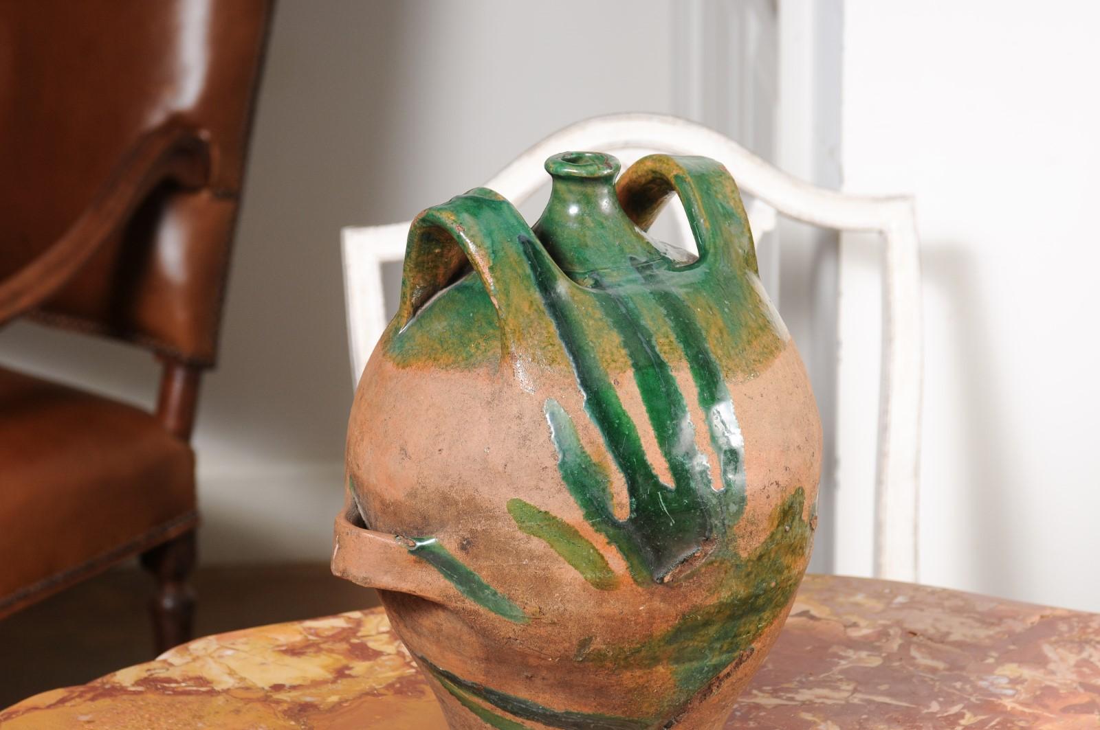 French Provincial 19th Century Green Glazed Pottery Jug with Dual Handles For Sale 1