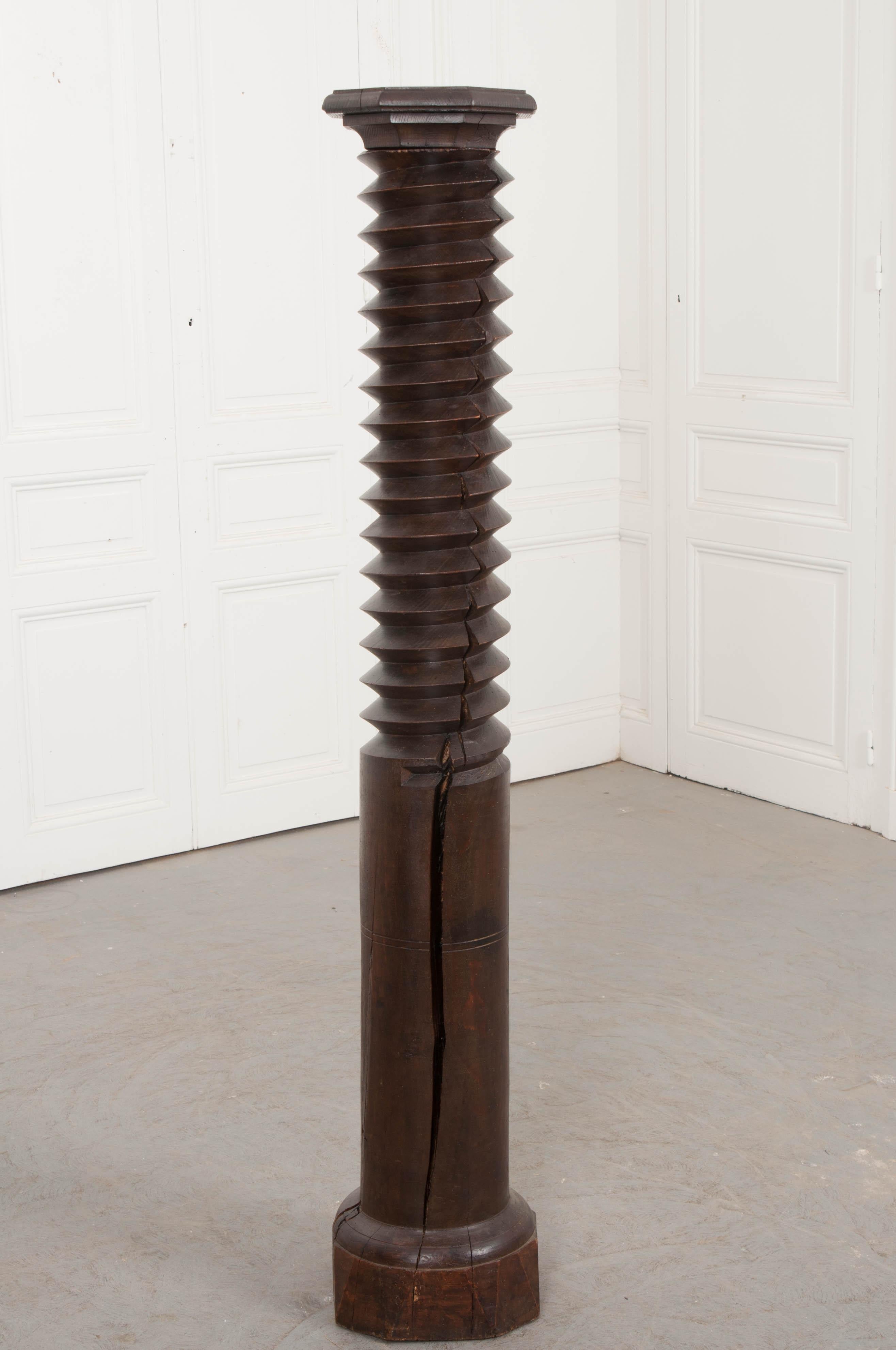 This wonderfully-aged wine press screw, circa 1880s, from a winery in France, has a deep wine-stained patina. Not only is this piece a conversation starter, its striking presence is sure to ground a room perfectly. It could also be converted into a
