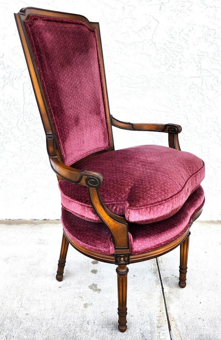 For FULL item description click on CONTINUE READING at the bottom of this page.

Offering One Of Our Recent Palm Beach Estate Fine Furniture Acquisitions Of A
1940s French Provincial Oversized Accent Armchair by Daniel Jones New York
With Burgundy