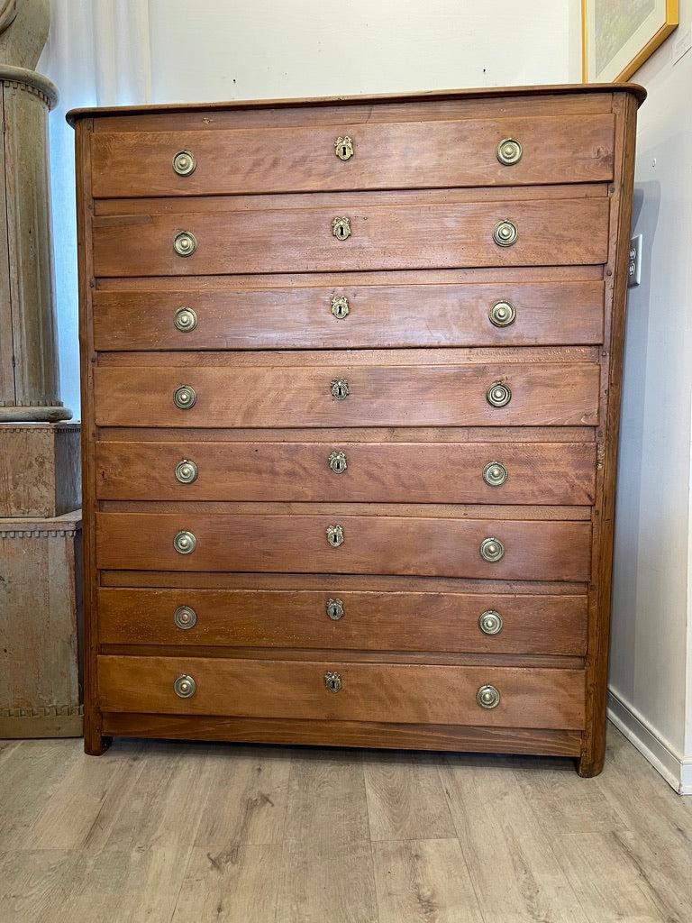 French Provincial Beechwood Semanier, of outstanding proportions and beautiful patina, late 18th-early 19th Century, having eight wide drawers and original gilt bronze pulls.  From a Park Ave.,NY estate. 62 3/4