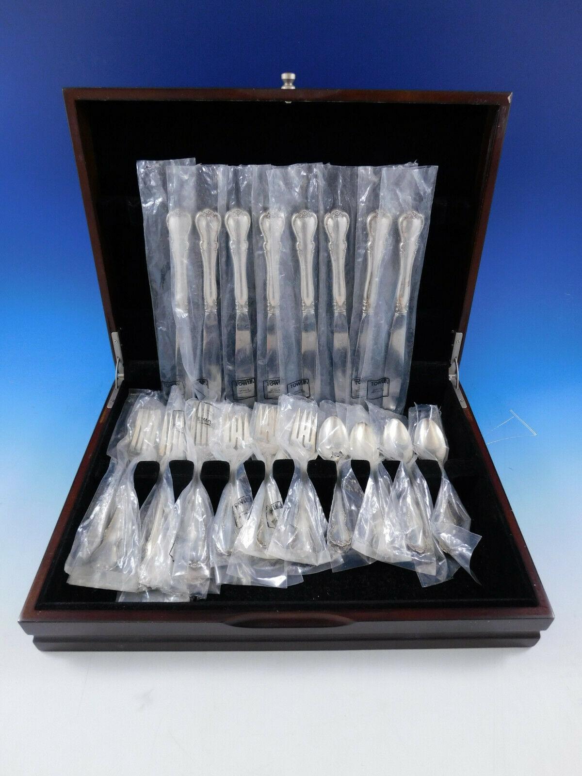 New, unused French Provincial by Towle Sterling silver flatware set, 32 pieces. This set includes:

8 knives, 8 7/8