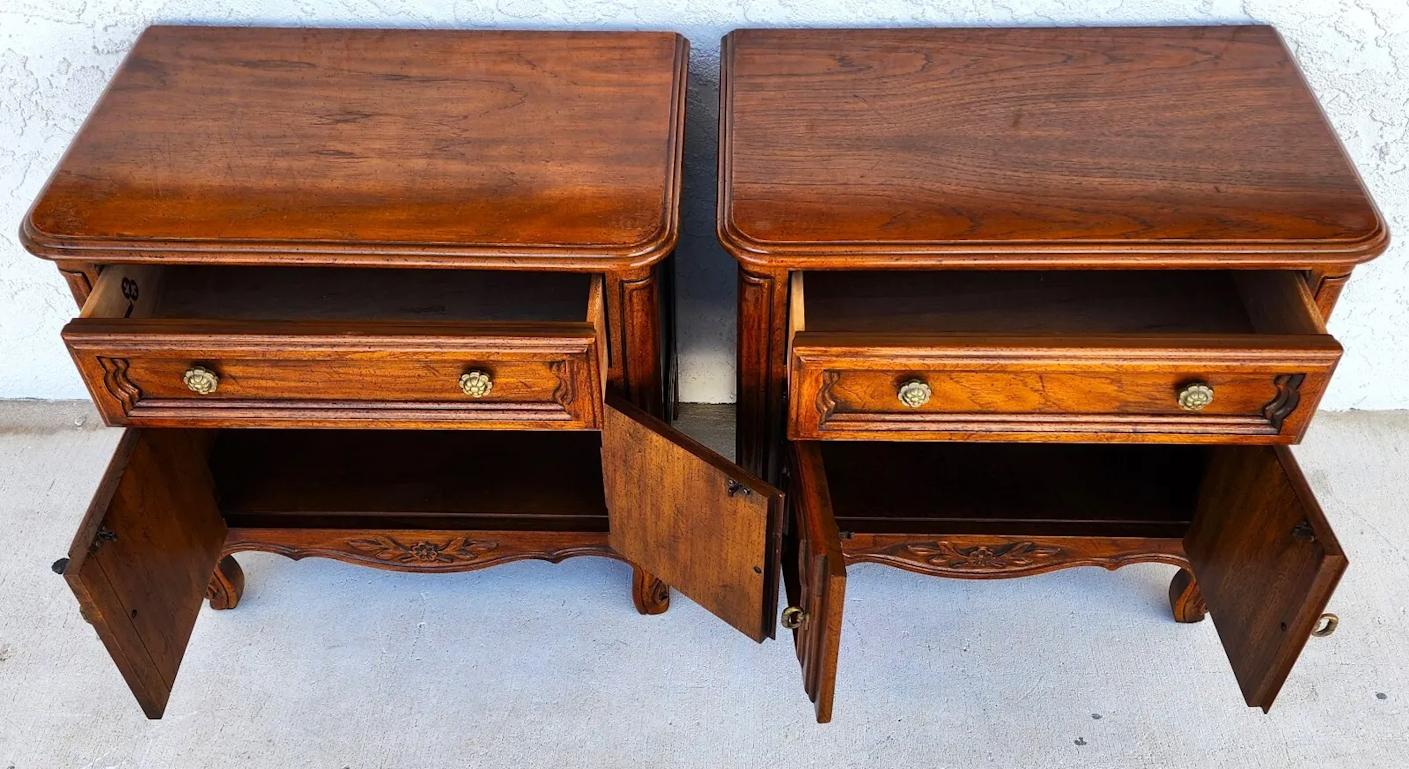 For FULL item description click on CONTINUE READING at the bottom of this page.

Offering One Of Our Recent Palm Beach Estate Fine Furniture Acquisitions Of A
Pair of Vintage French Provincial Cabernet Nightstands by Drexel
Very solid and well-made