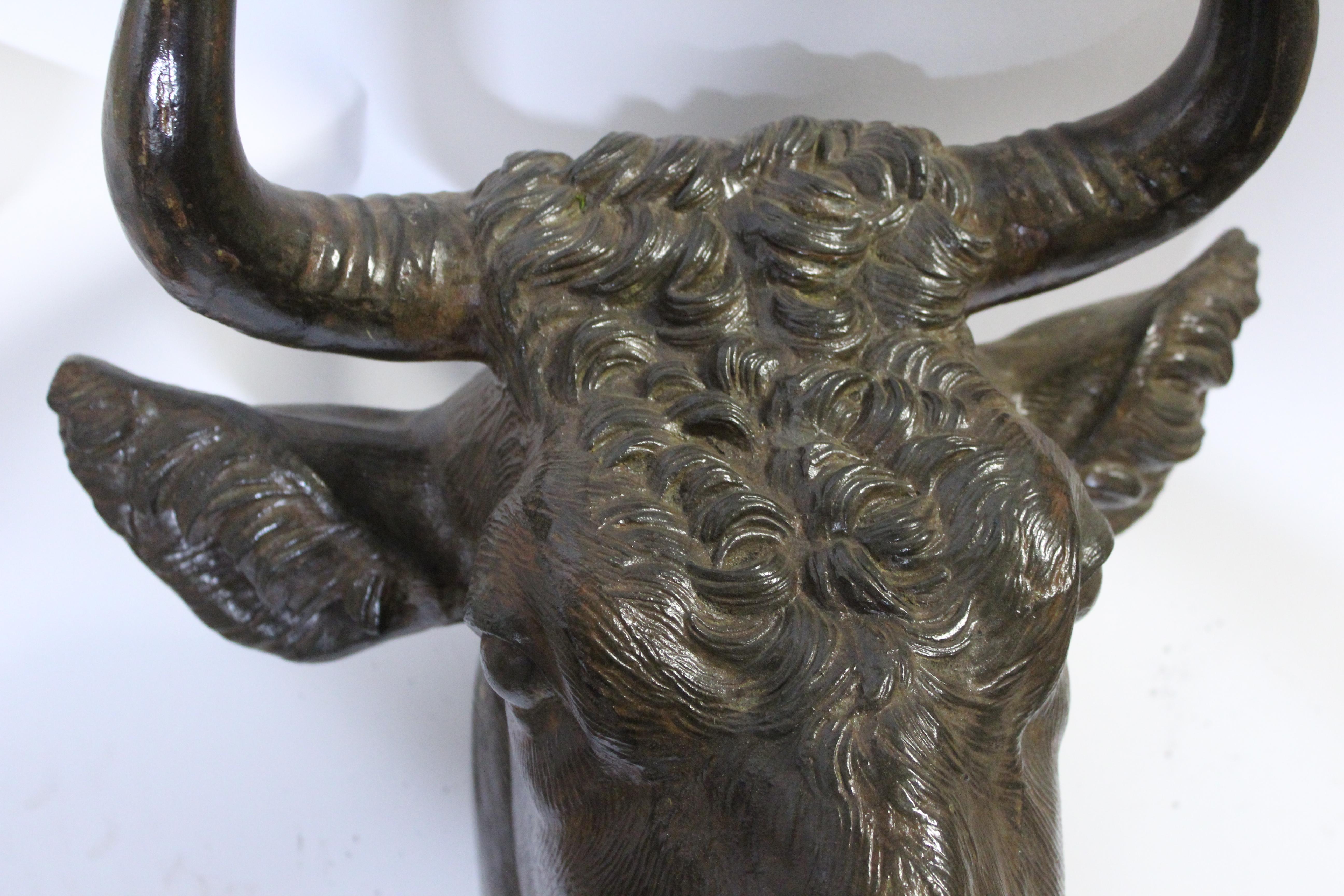 Beautiful, rich brown with vivid detail, this French provincial cast iron bull wall mount sculpture would make a fantastic statement piece in a living room, country kitchen, lodge or restaurant.
 