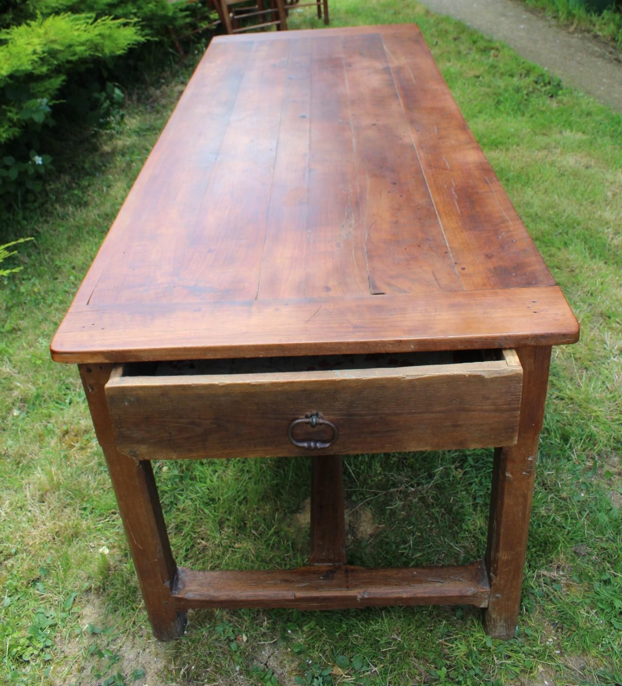 19th Century French Provincial Cherrywood Farmhouse Dining Table – Circa 1850s – Antique Elegant Dining Furniture

This 19th-century French Provincial cherrywood farmhouse table (circa 1850s) is a true testament to rustic elegance and timeless