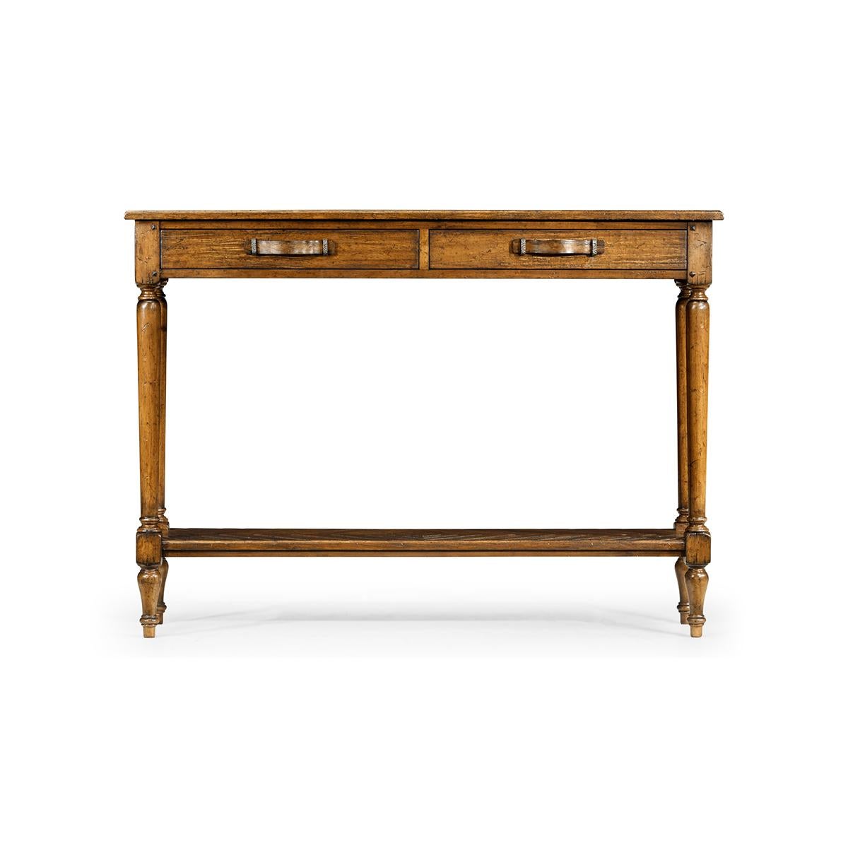 French Provincial console table, with a heavily distressed country walnut finish, this parquet top console has two drawers and under-tier. Bentwood and iron handles contrasting dark geometric inlay to panels. Raised on turned and tapered