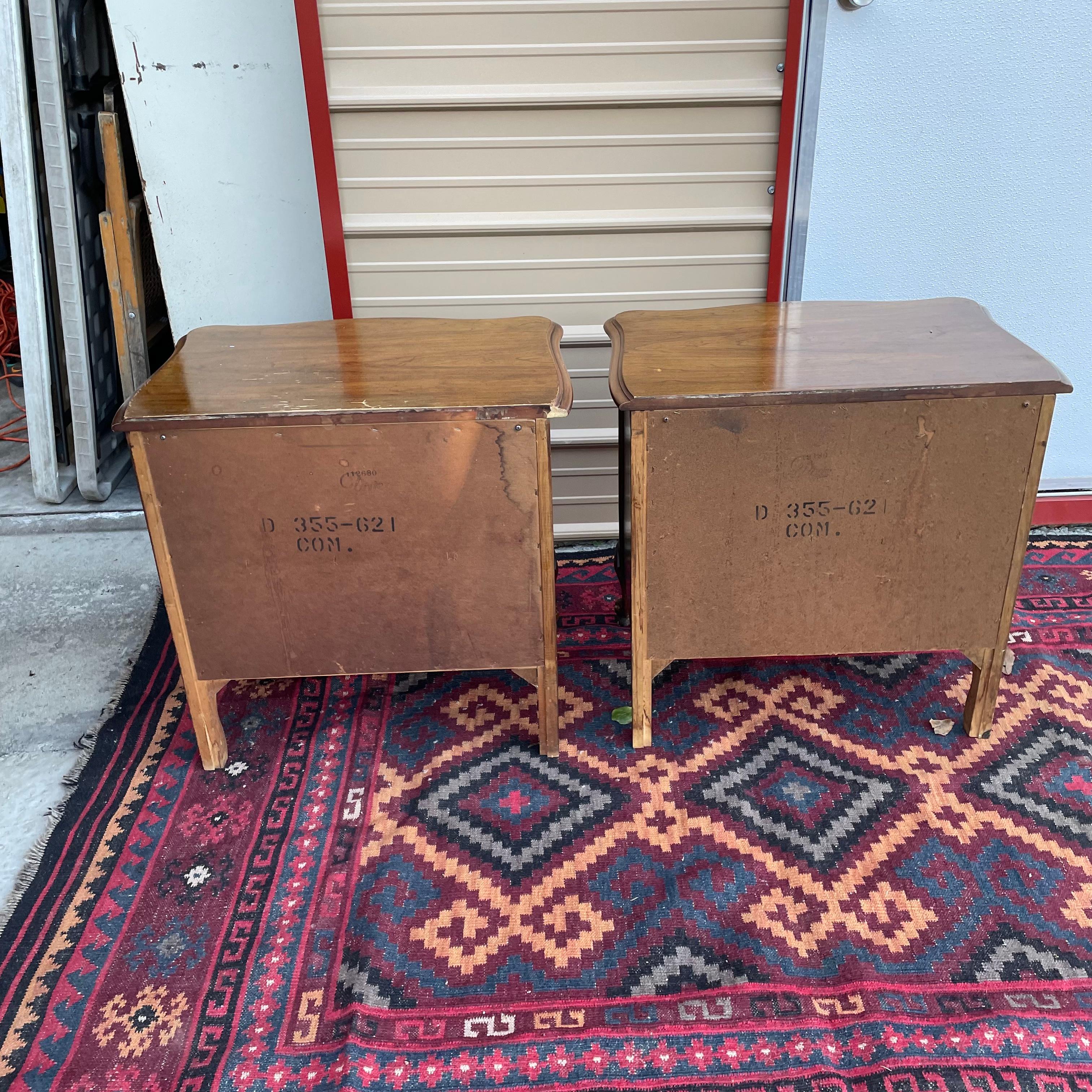 Pair of Dixie French Provinicial nightstands. Both could use a little work. However both are structurally sound and do not wobble in the least. The top to both nightstands could use refinishing. Either that or you could have them both painted in