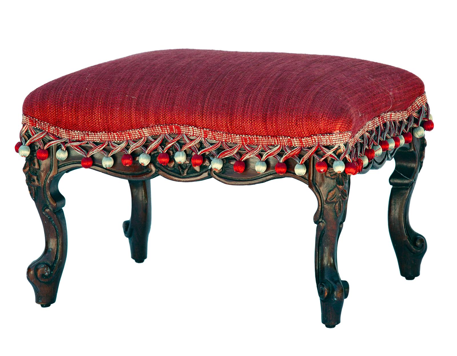 French Provincial Footstool in Platner & Co red linen blend/ Samuel & Sons silk pompoms over a handcarved walnut with carved cabriole legs.
Crafted with meticulous attention to detail, this footstool is a testament to the timeless beauty of French