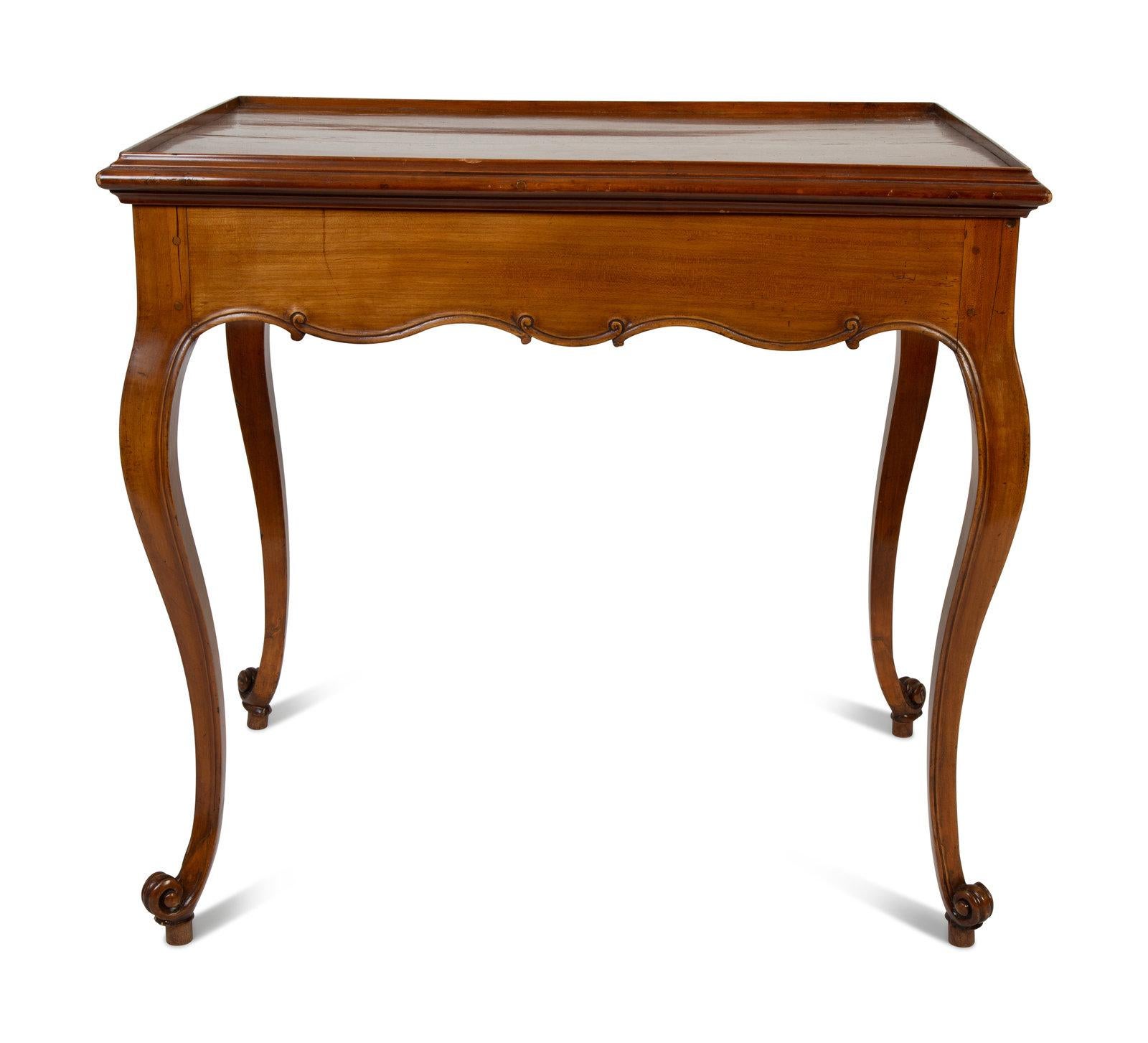 French cabriole leg flip-top games console table. Carved fruitwood with scalloped apron and finely tapered legs.