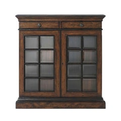 Petite armoire provinciale à portes vitrées