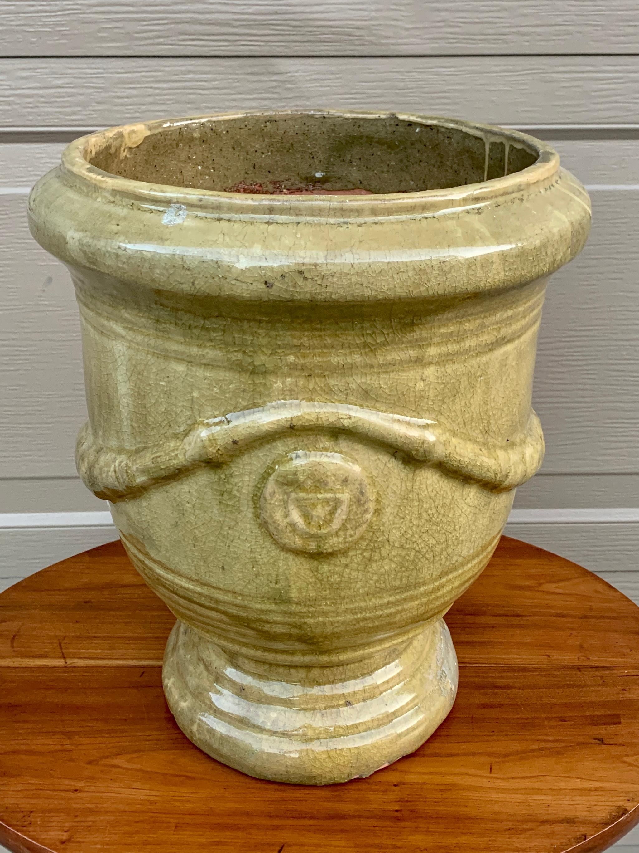 A gorgeous French Provincial planter or garden pot

France, Late-20th Century

Hand-made glazed earthenware in a lovely light green color.

Measures: 12