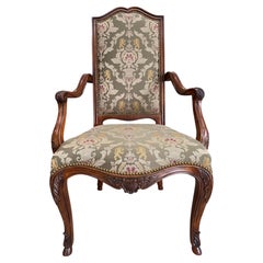 French Provincial high-back tufted chairs with carved mahogany frames