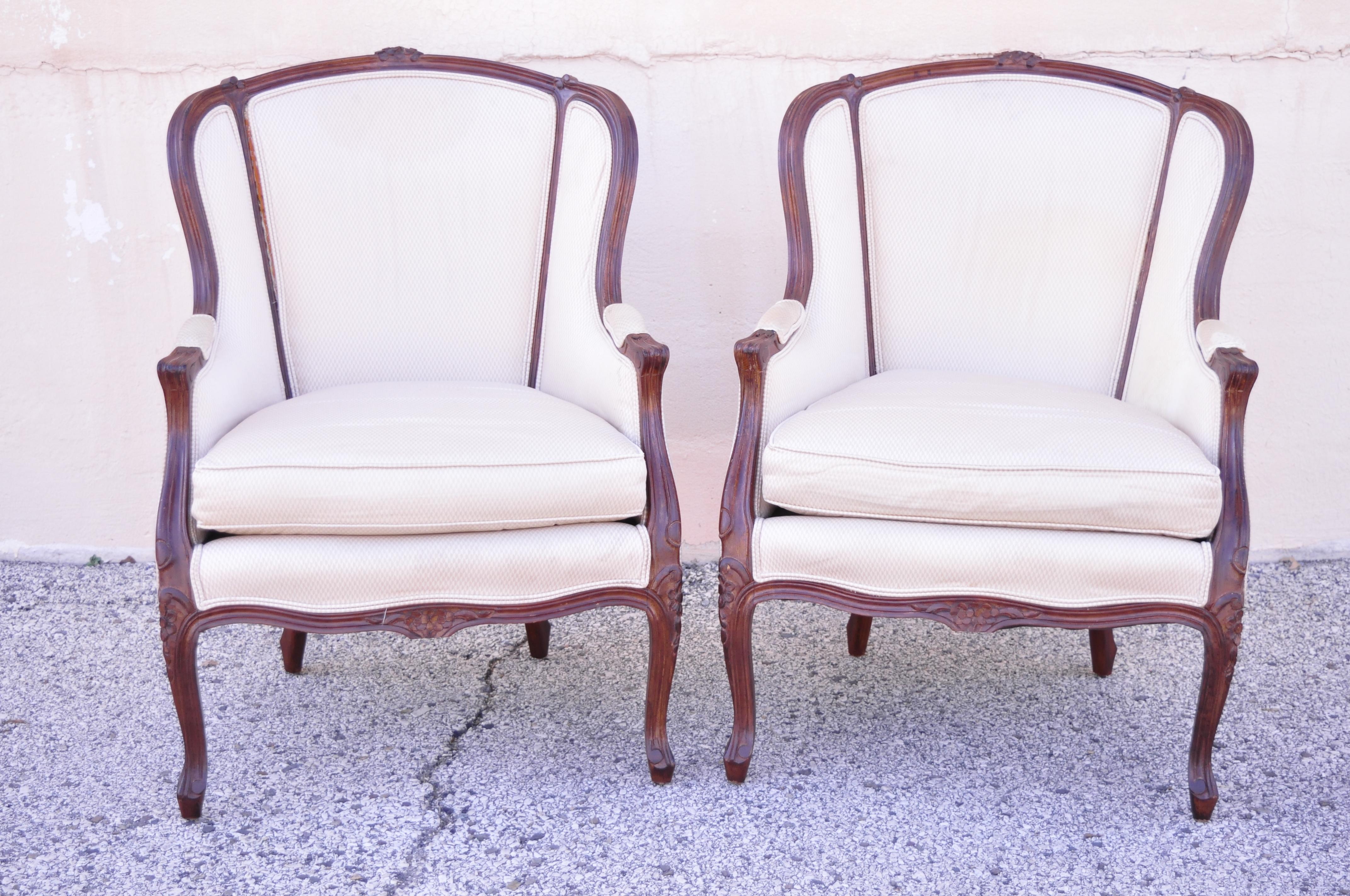 French Provincial Louis XV Style Bergere lounge club arm chairs by Jeffco - a Pair. Item features solid wood construction, upholstered armrests, nicely carved details, original label, cabriole legs, quality American craftsmanship, great style and