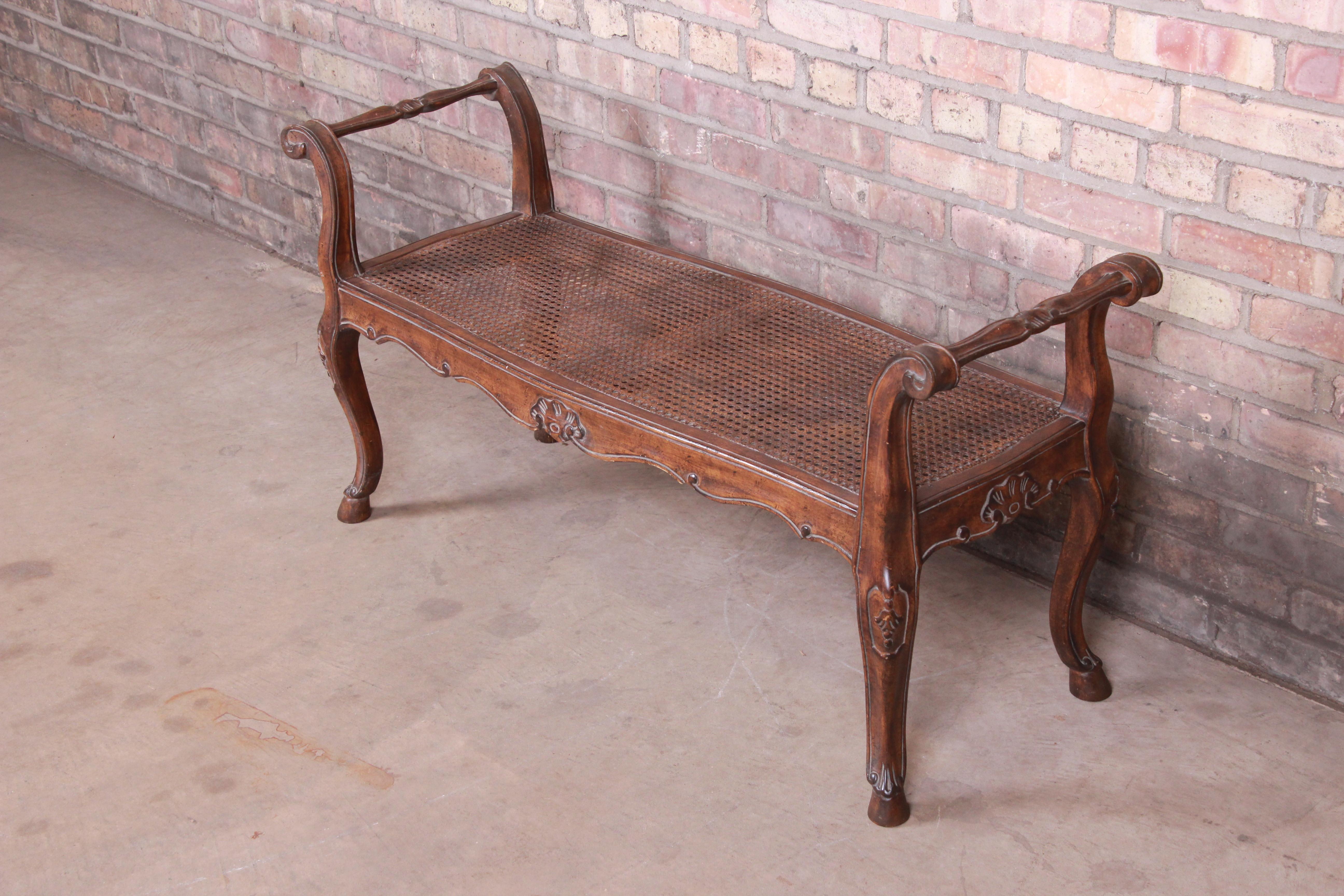 20th Century French Provincial Louis XV Carved Walnut and Cane Window Bench