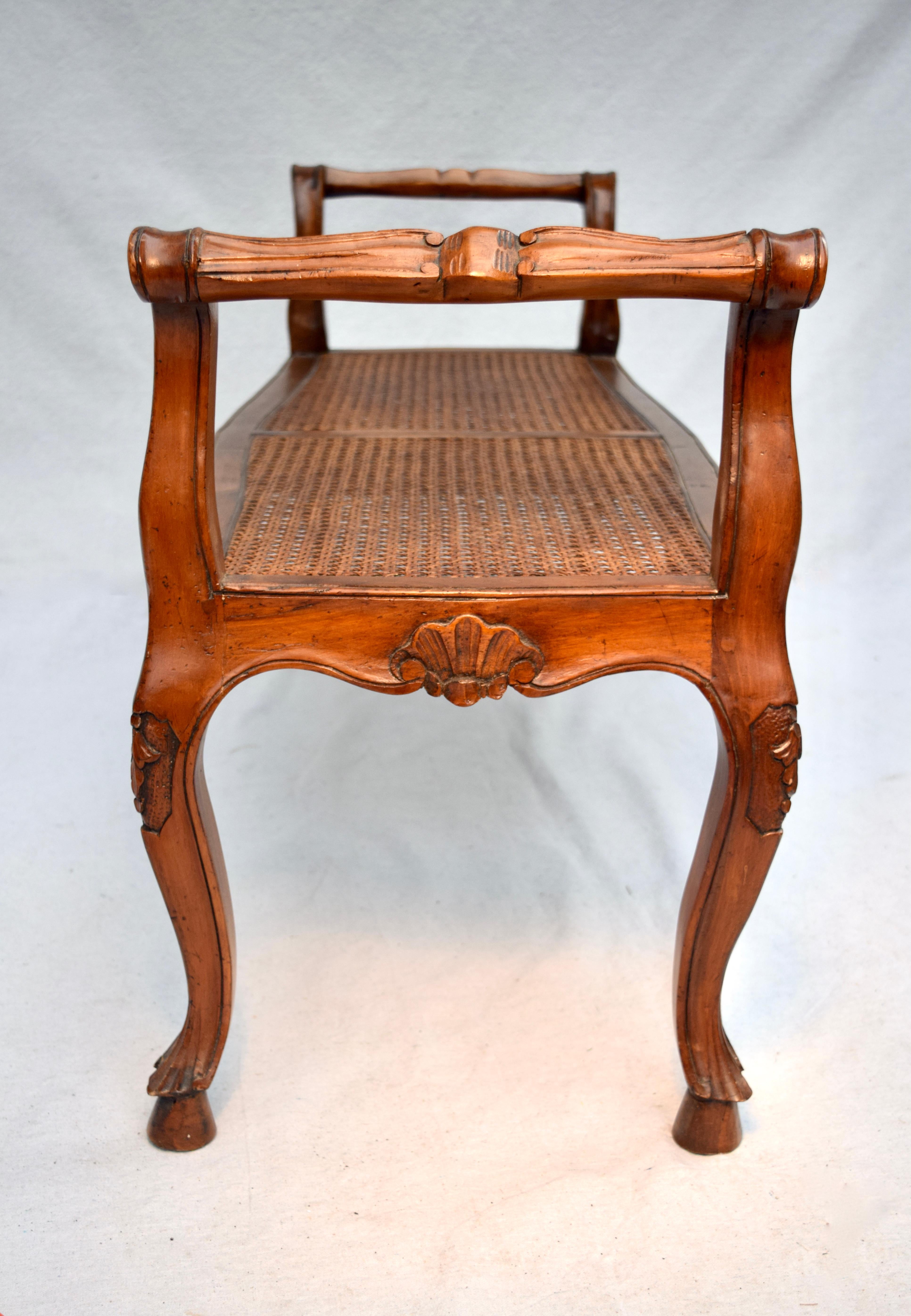 French Provincial Louis XV Carved Walnut and Cane Window Bench In Good Condition In Southampton, NJ