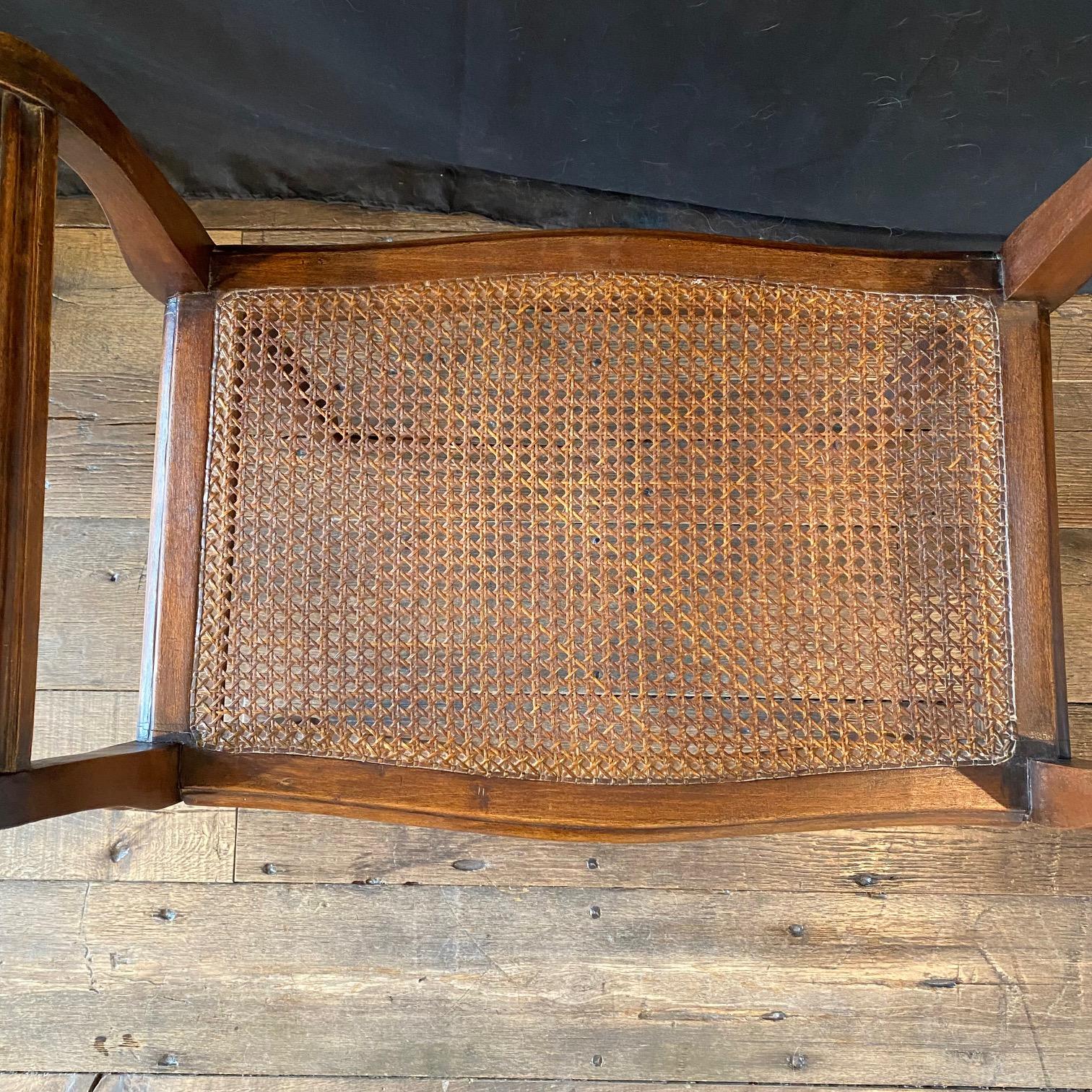 French Provincial Louis XV Carved Walnut Bench or Ottoman with Caning In Good Condition For Sale In Hopewell, NJ
