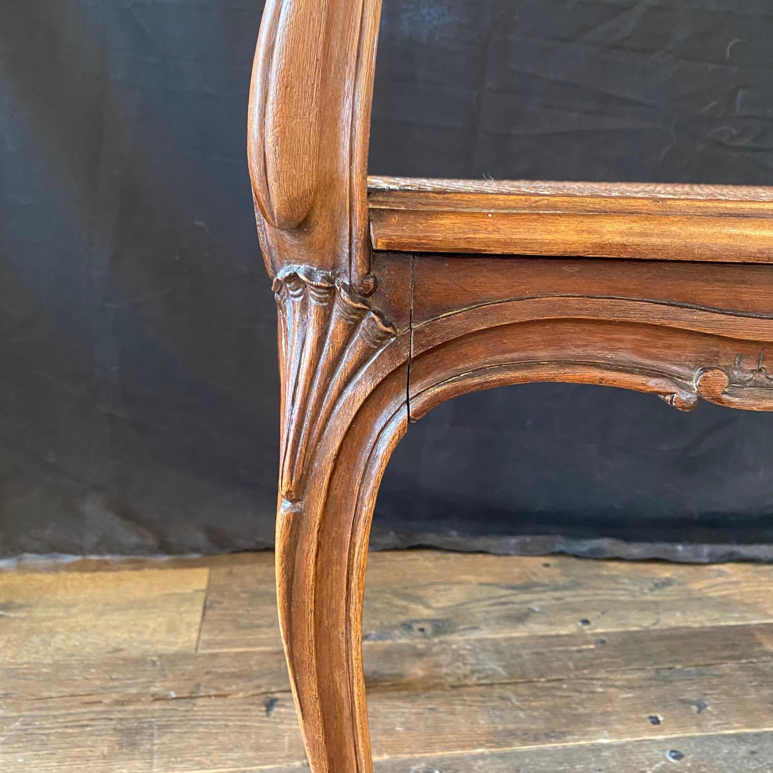French Provincial Louis XV Carved Walnut Bench or Ottoman with Caning For Sale 1