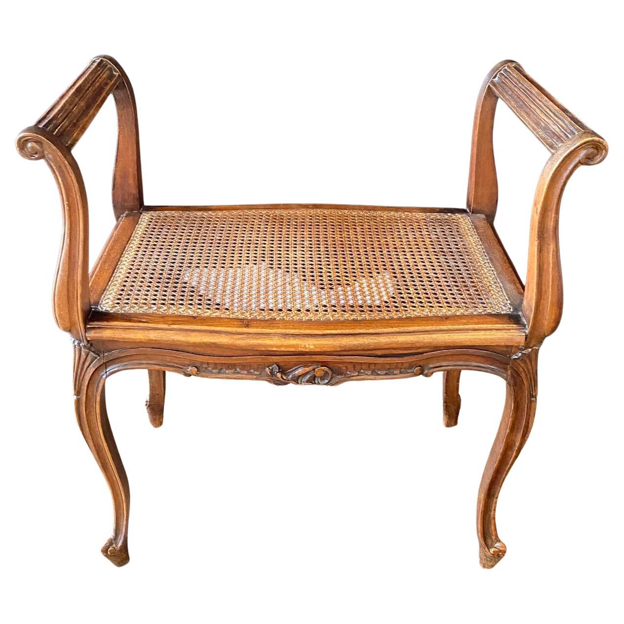 French Provincial Louis XV Carved Walnut Bench or Ottoman with Caning For Sale