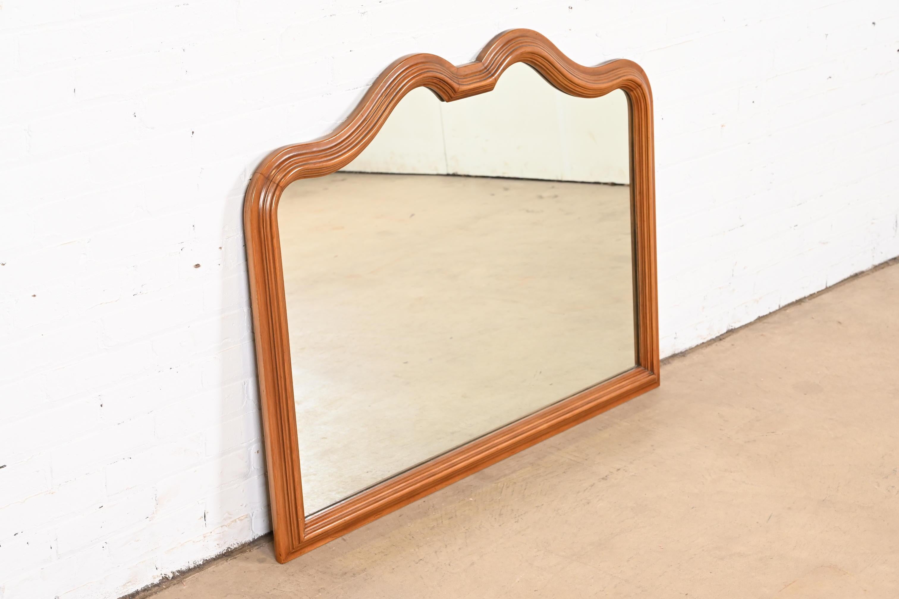 American French Provincial Louis XV Carved Walnut Wall Mirror by Davis Cabinet Co.